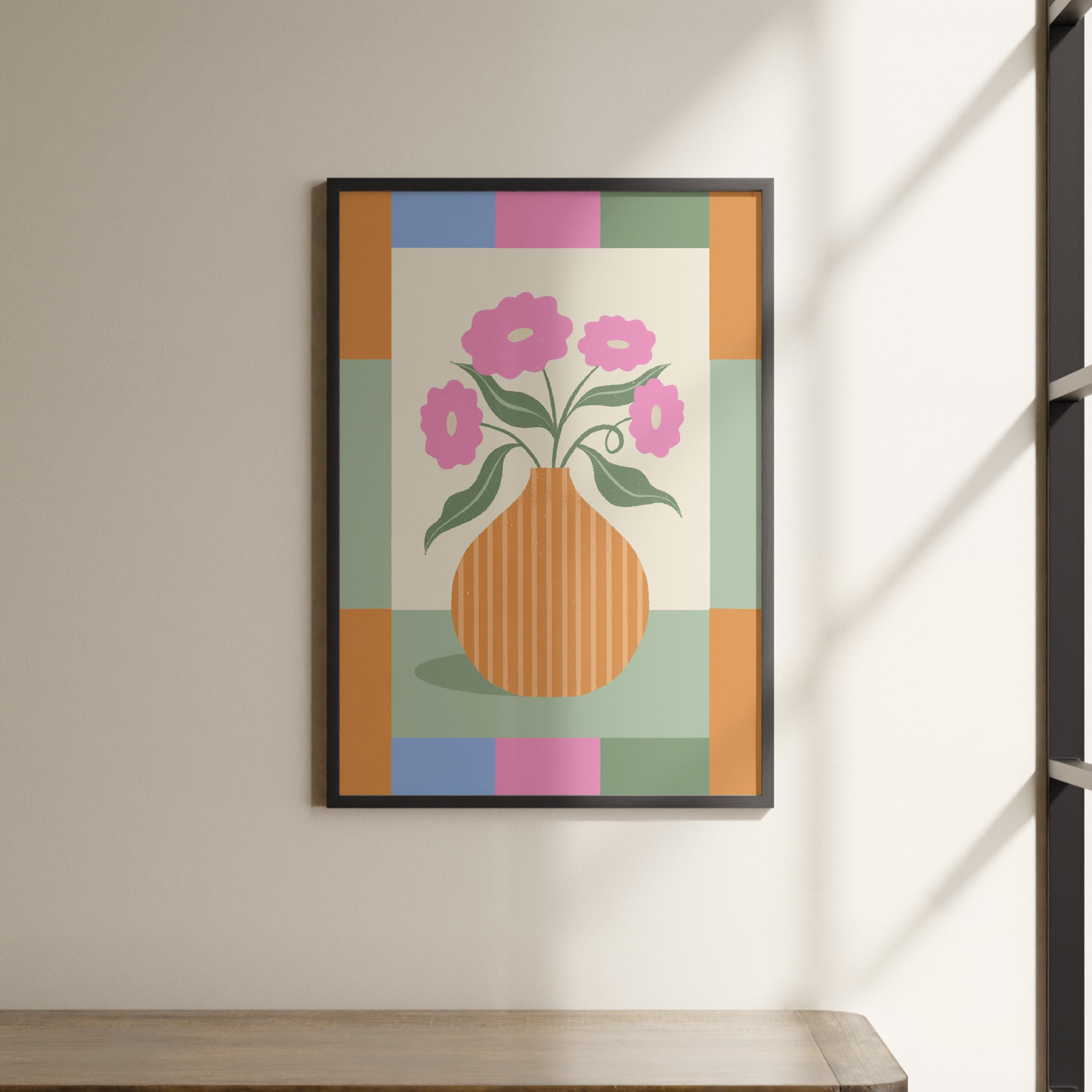 a picture of a vase with flowers on a wall