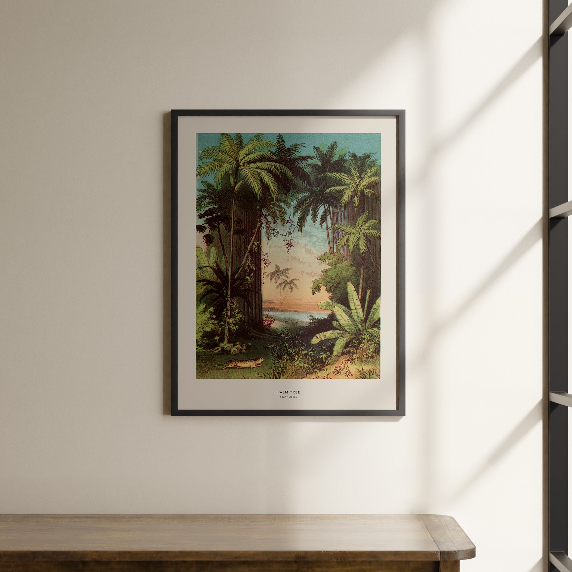 a painting hanging on a wall next to a wooden table