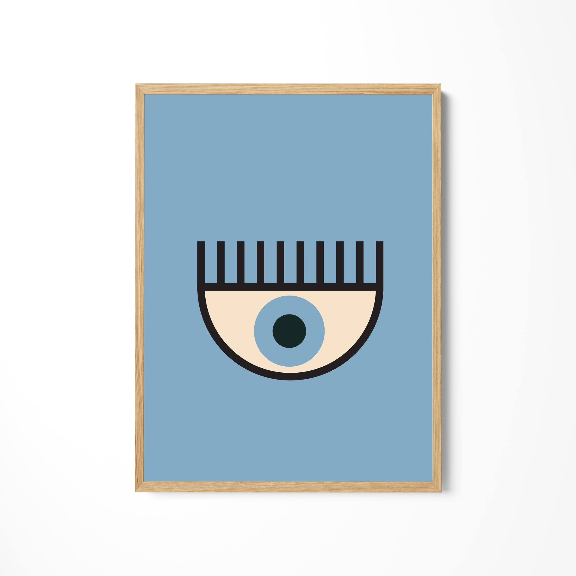 a picture of a blue eye with a black dot on it