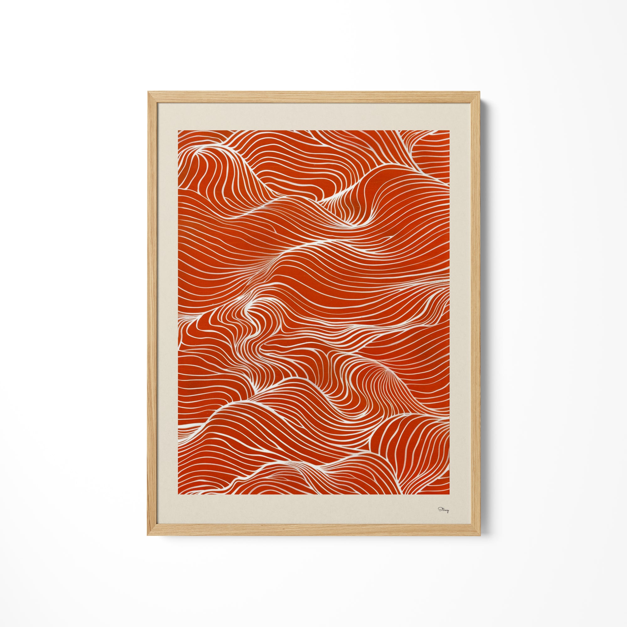 an orange and white print on a wall