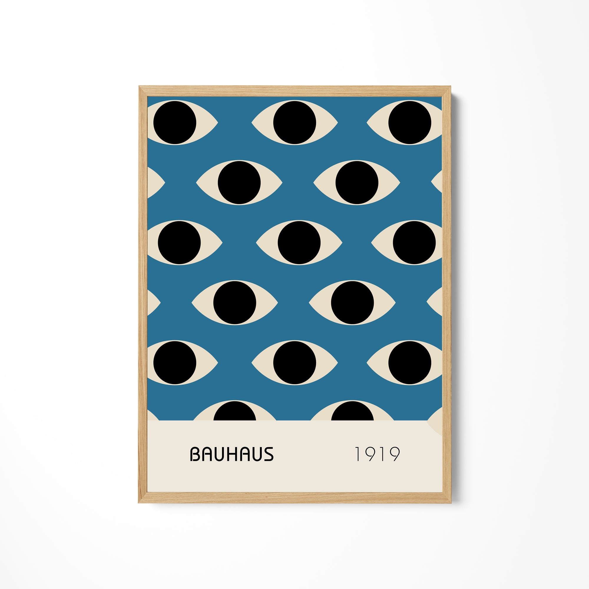 a blue poster with black and white circles on it