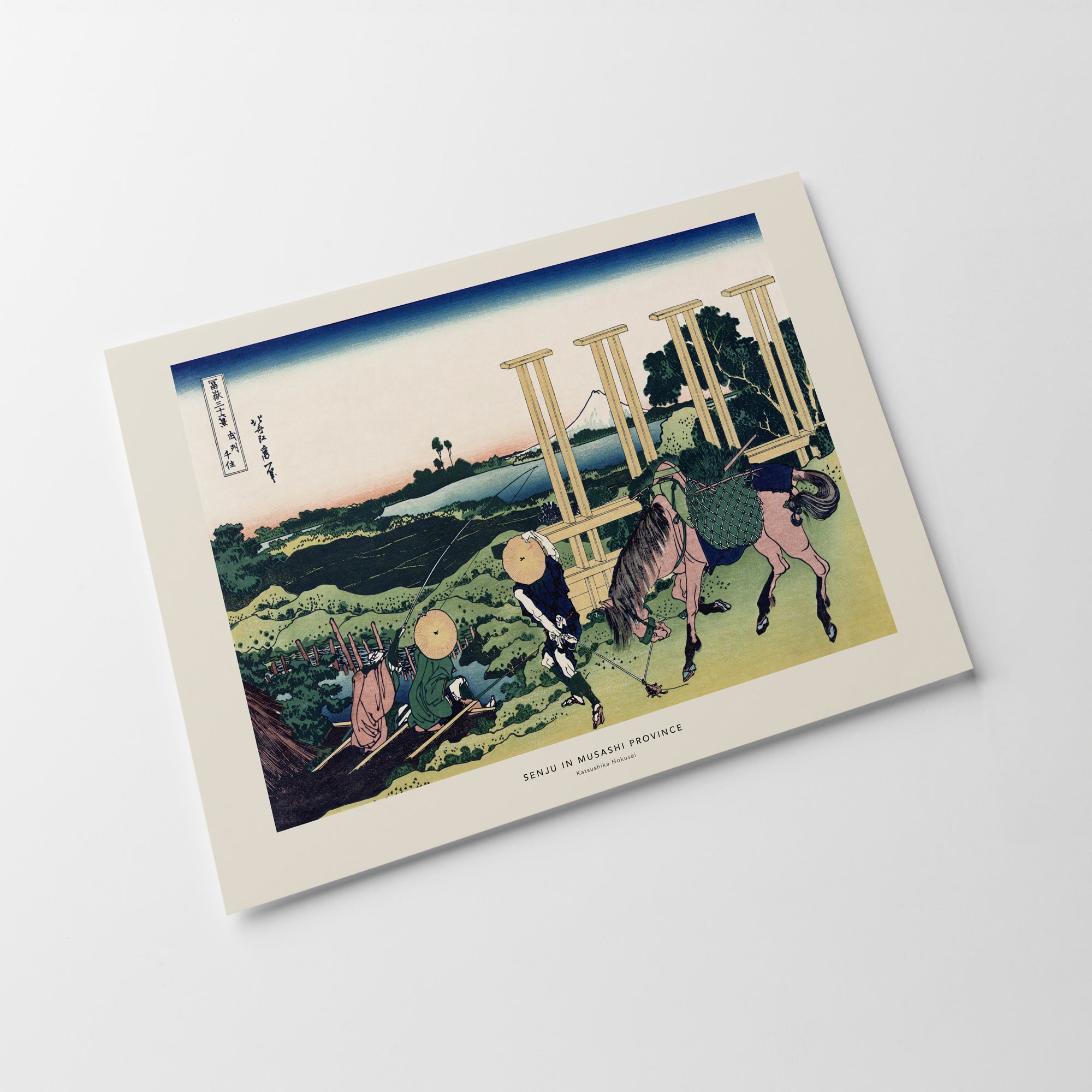 a postcard with a picture of a man on a horse