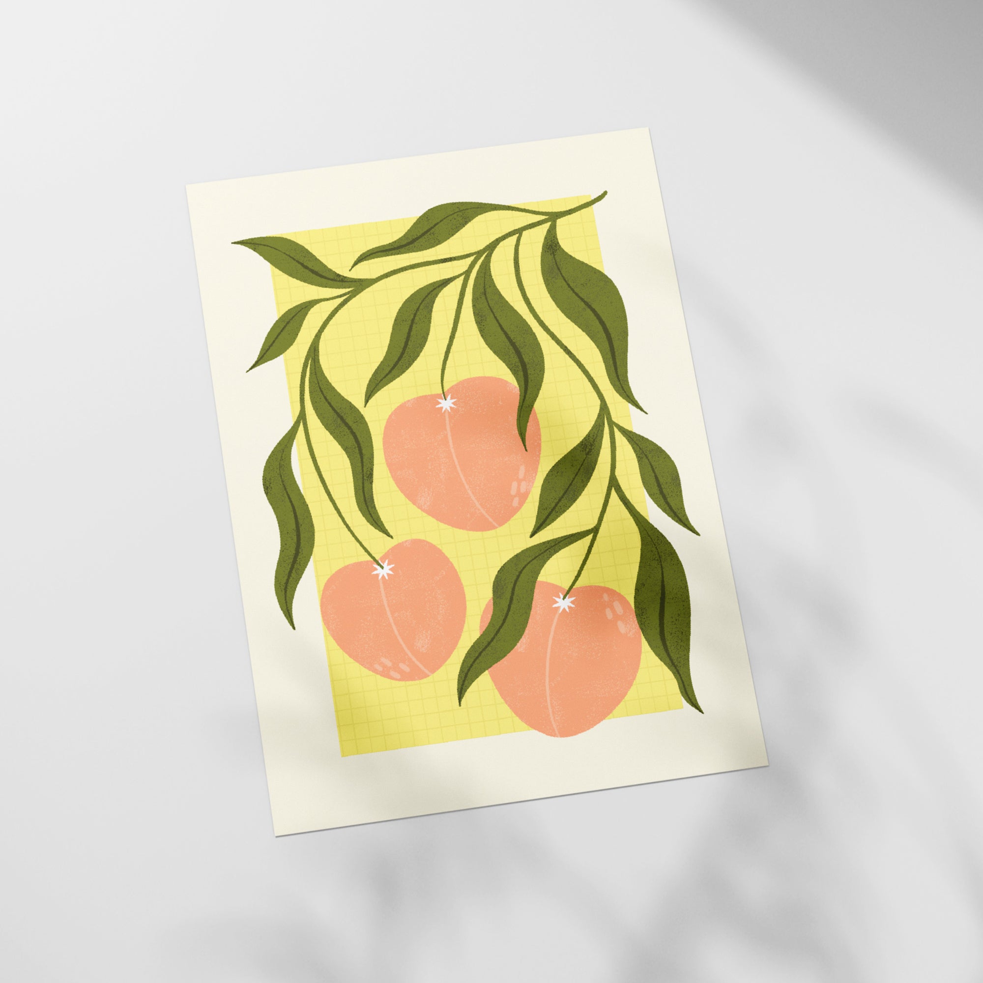 a piece of paper with a picture of peaches on it