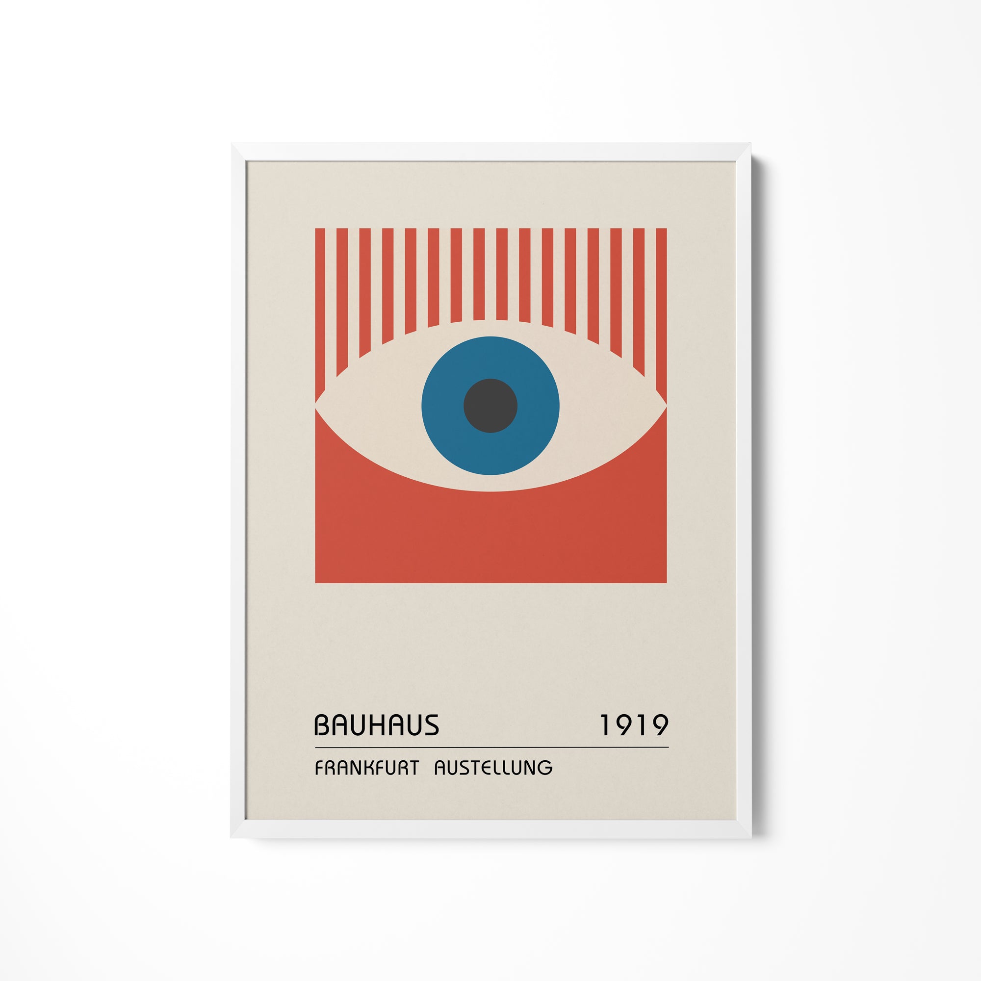 a poster of a blue eye on a white wall