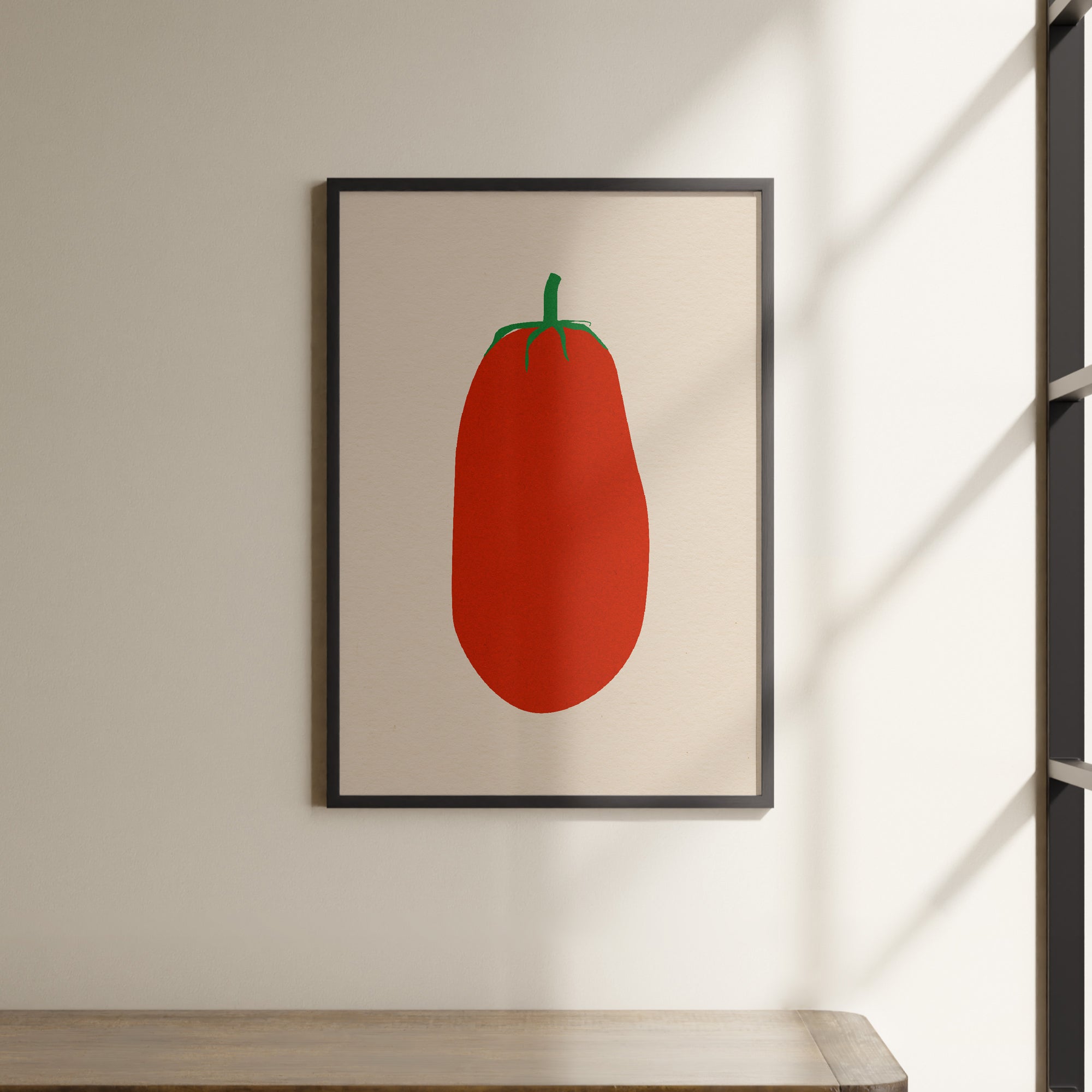 a picture of a red pepper hanging on a wall