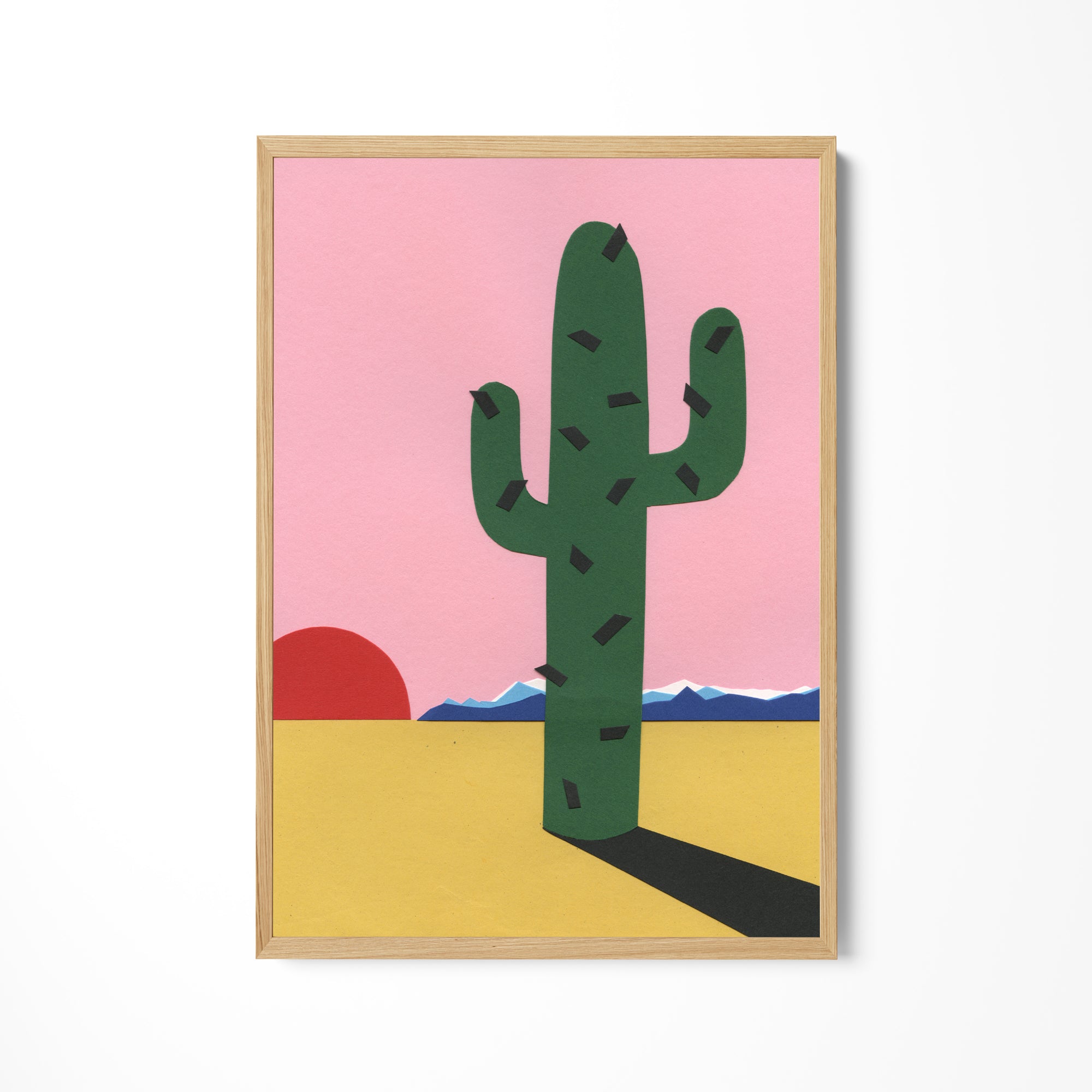 a picture of a cactus on a wall