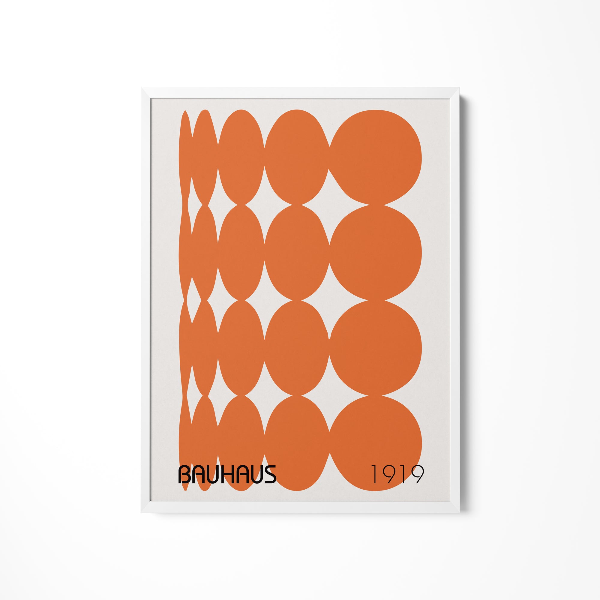 a picture of an orange and white pattern on a wall