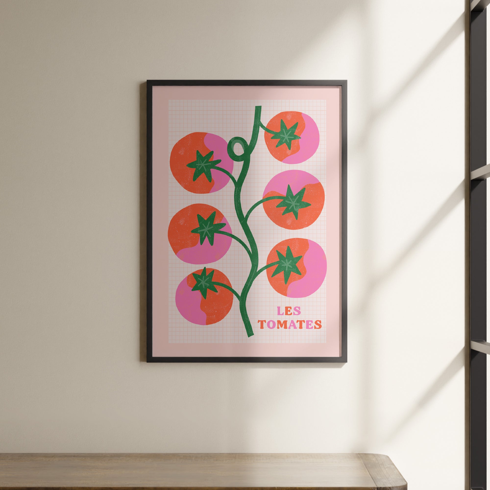 a picture hanging on a wall above a shelf