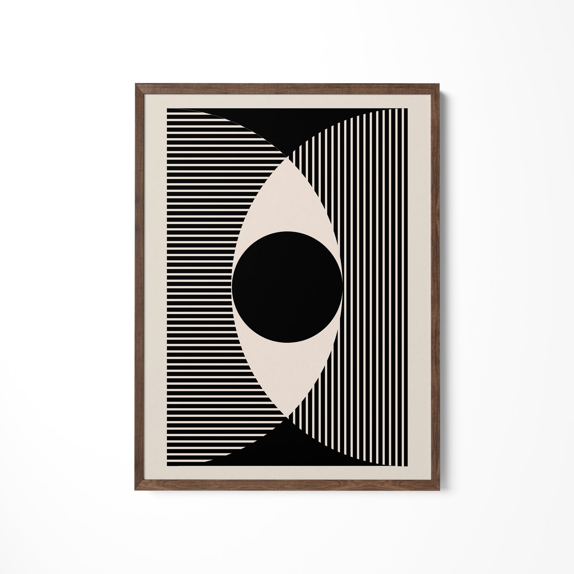 a black and white picture hanging on a wall