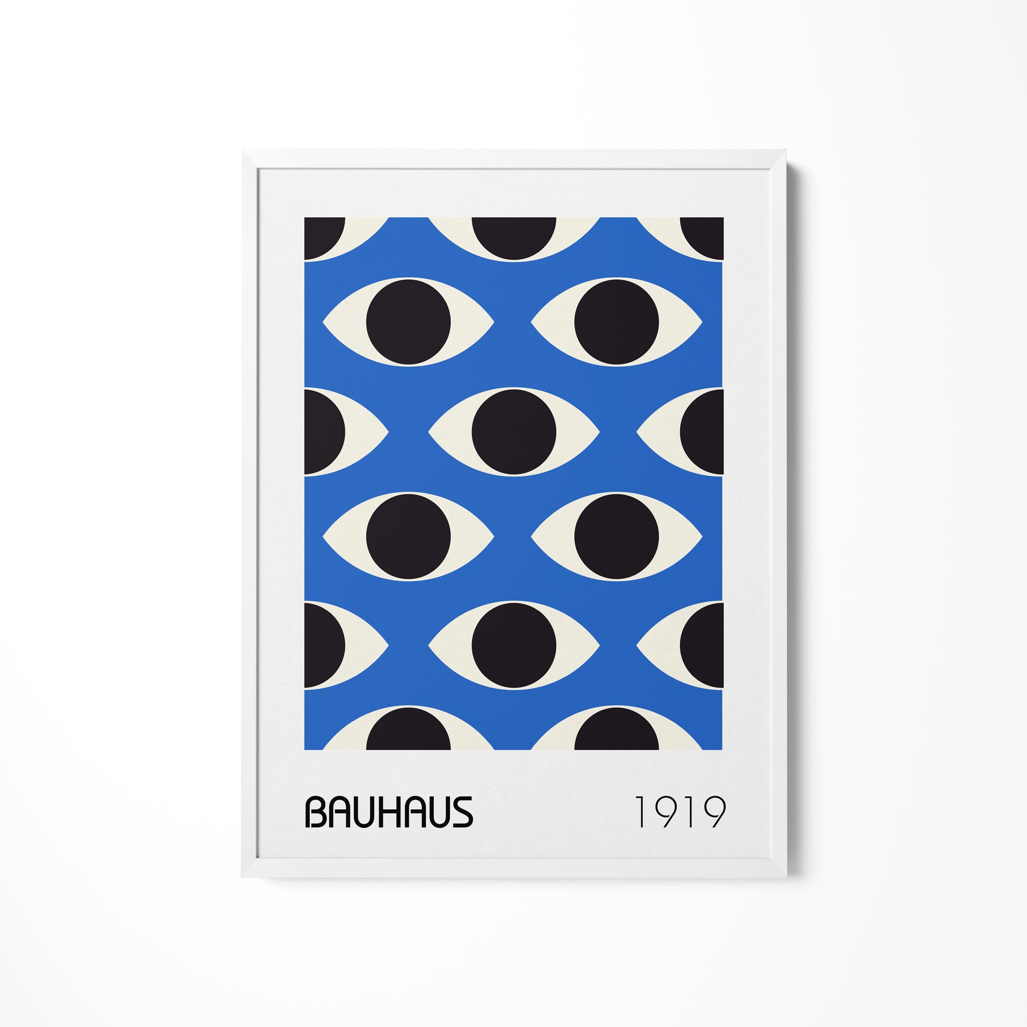 a picture of a blue and black pattern on a white wall