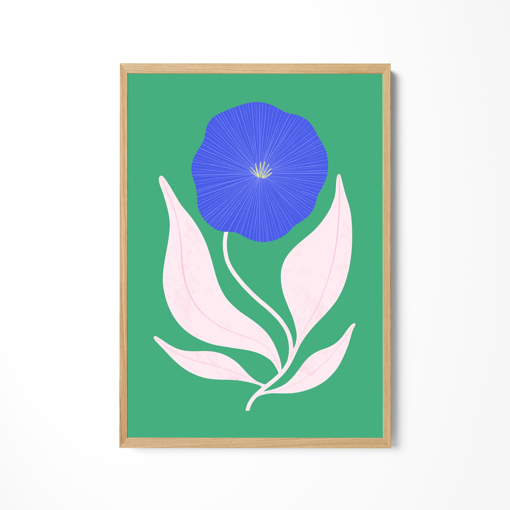 a picture of a blue flower on a green background