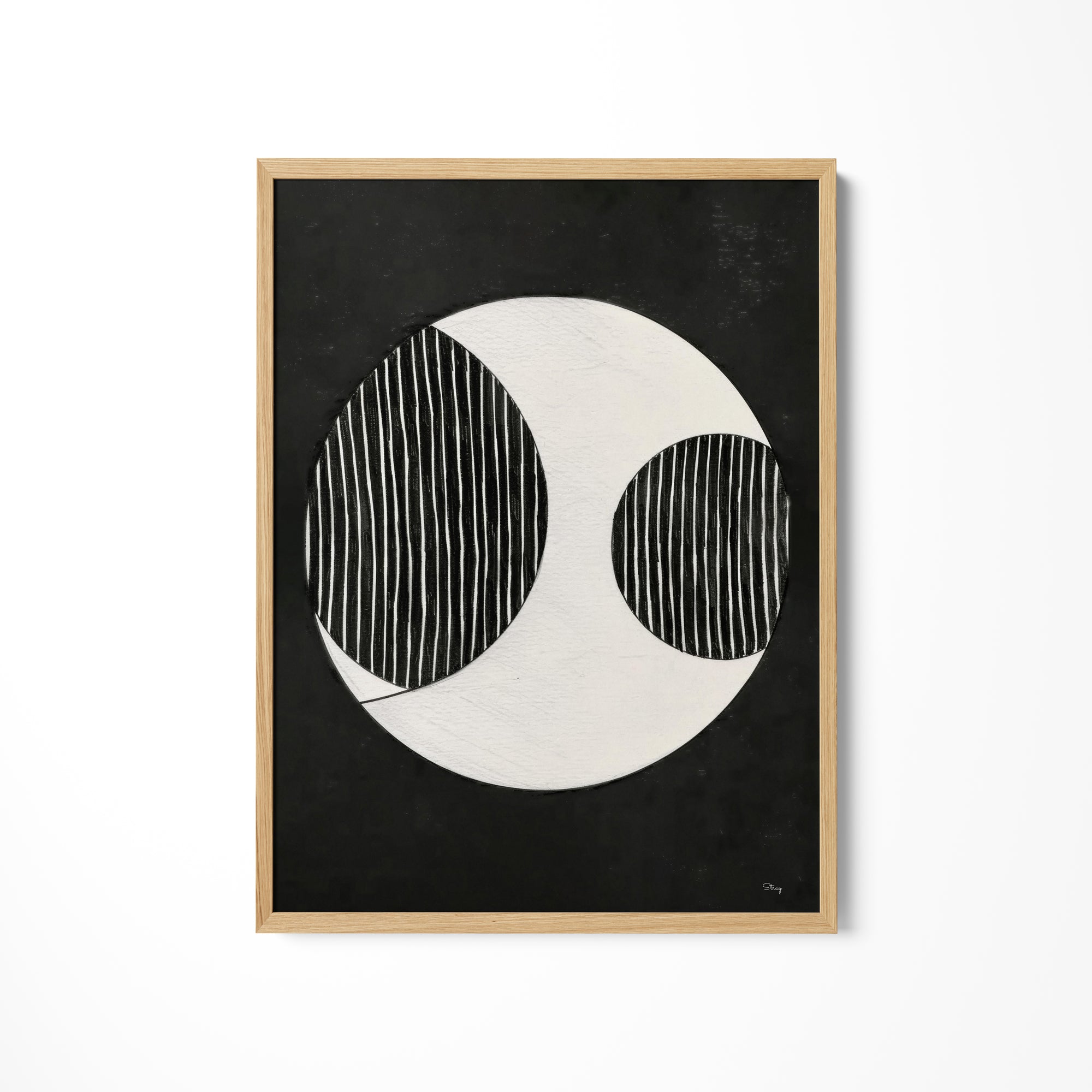 a black and white painting hanging on a wall