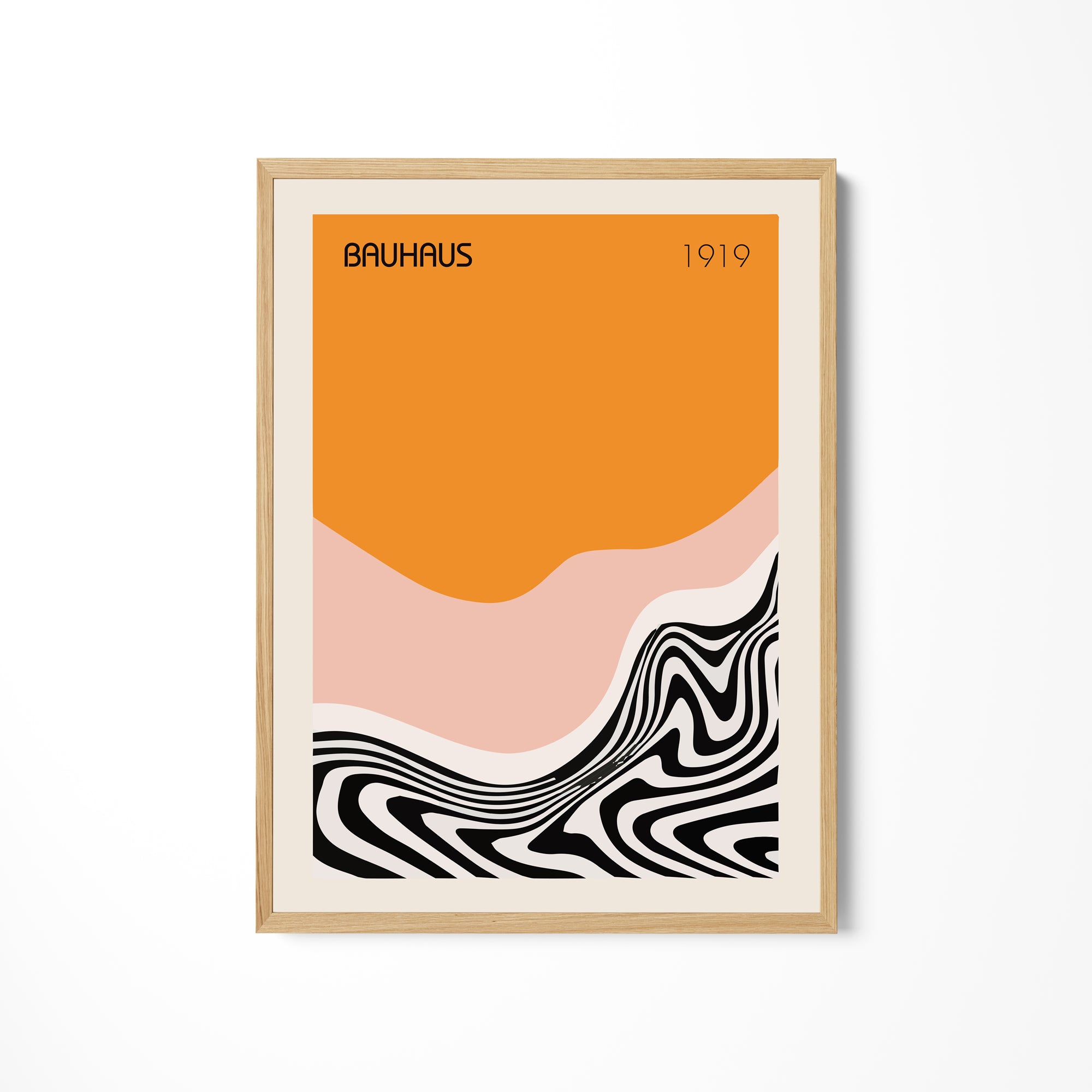 a picture of an orange and pink poster hanging on a wall