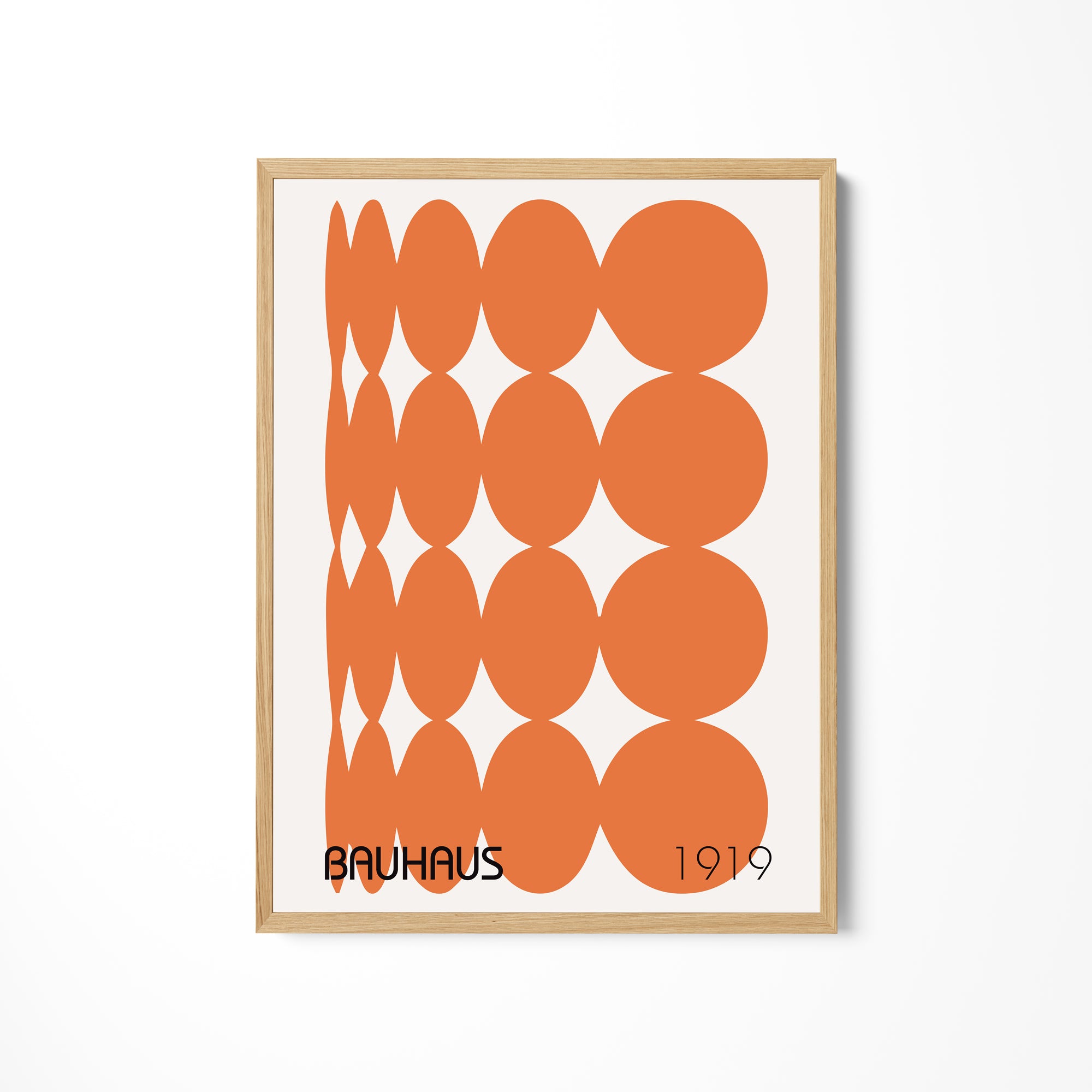 a picture of an orange and white pattern on a wall