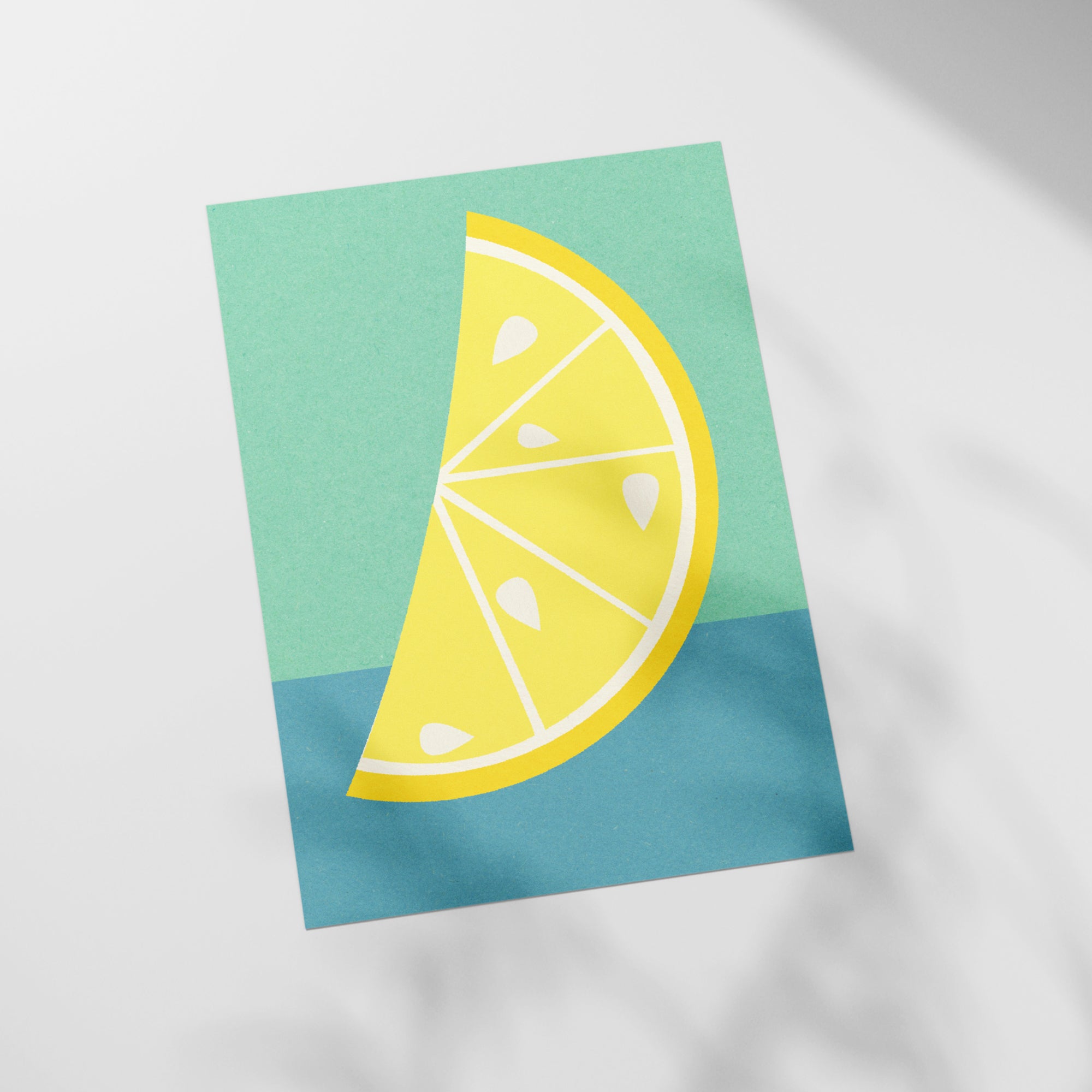 a piece of paper that has a cut in half lemon on it