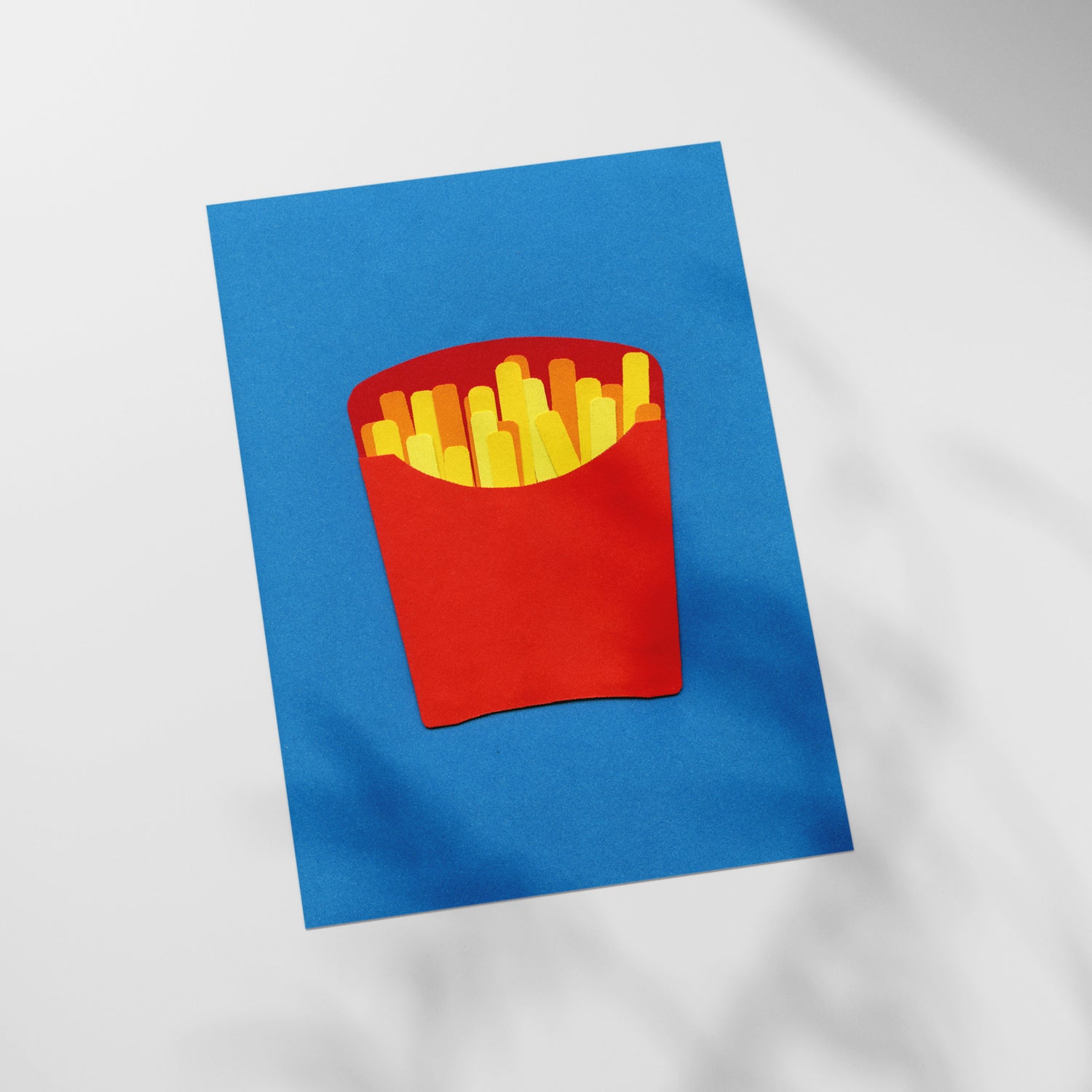 a picture of french fries cut out of paper