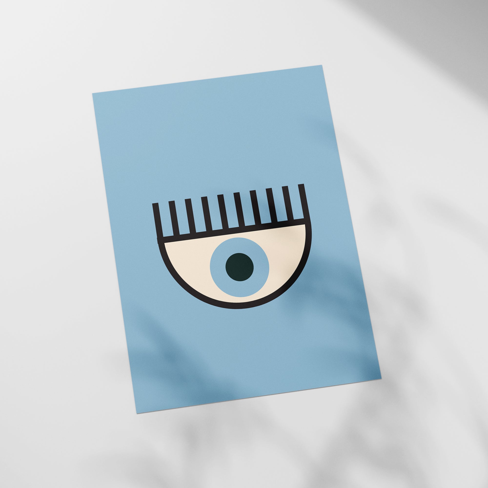 a close up of a piece of paper with a picture of an eye