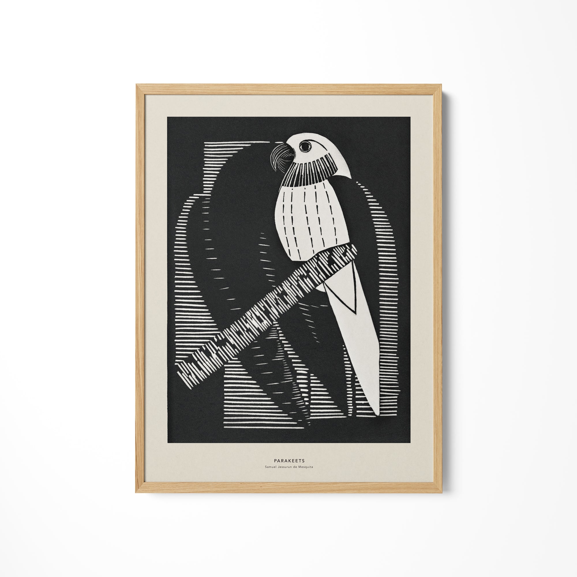 a black and white picture of a bird on a branch