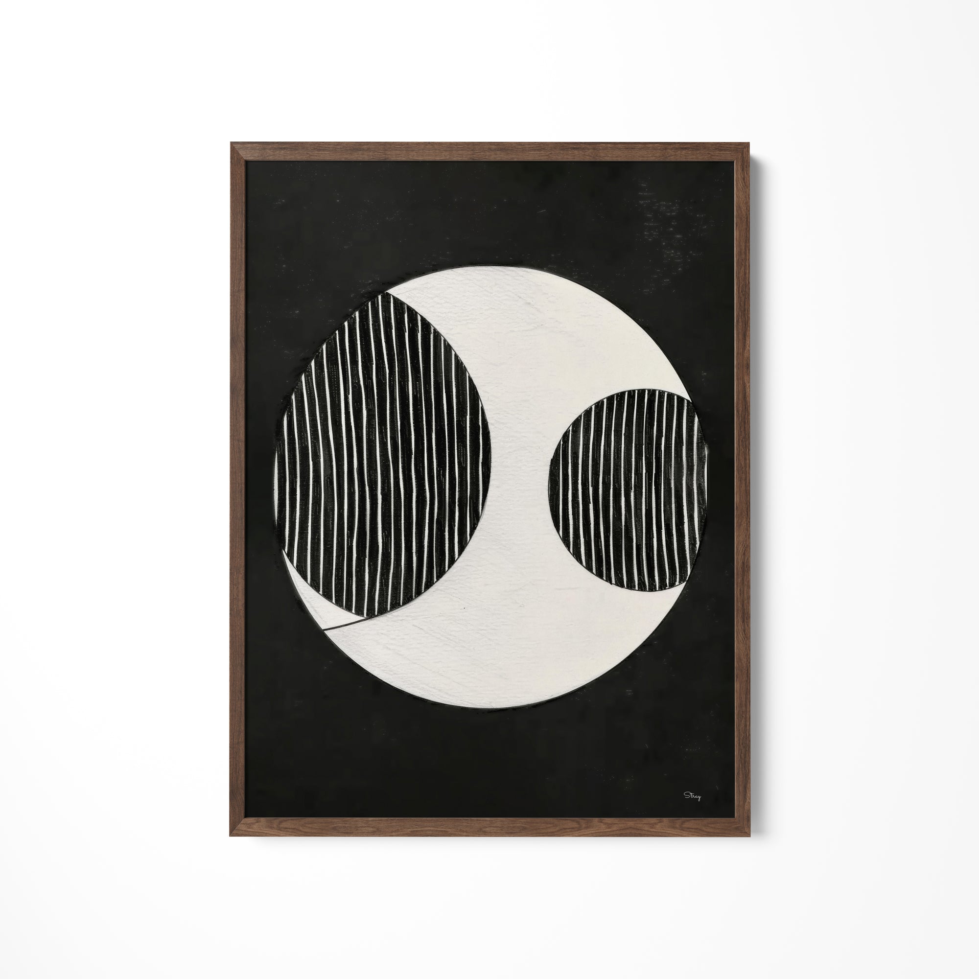 a black and white painting hanging on a wall