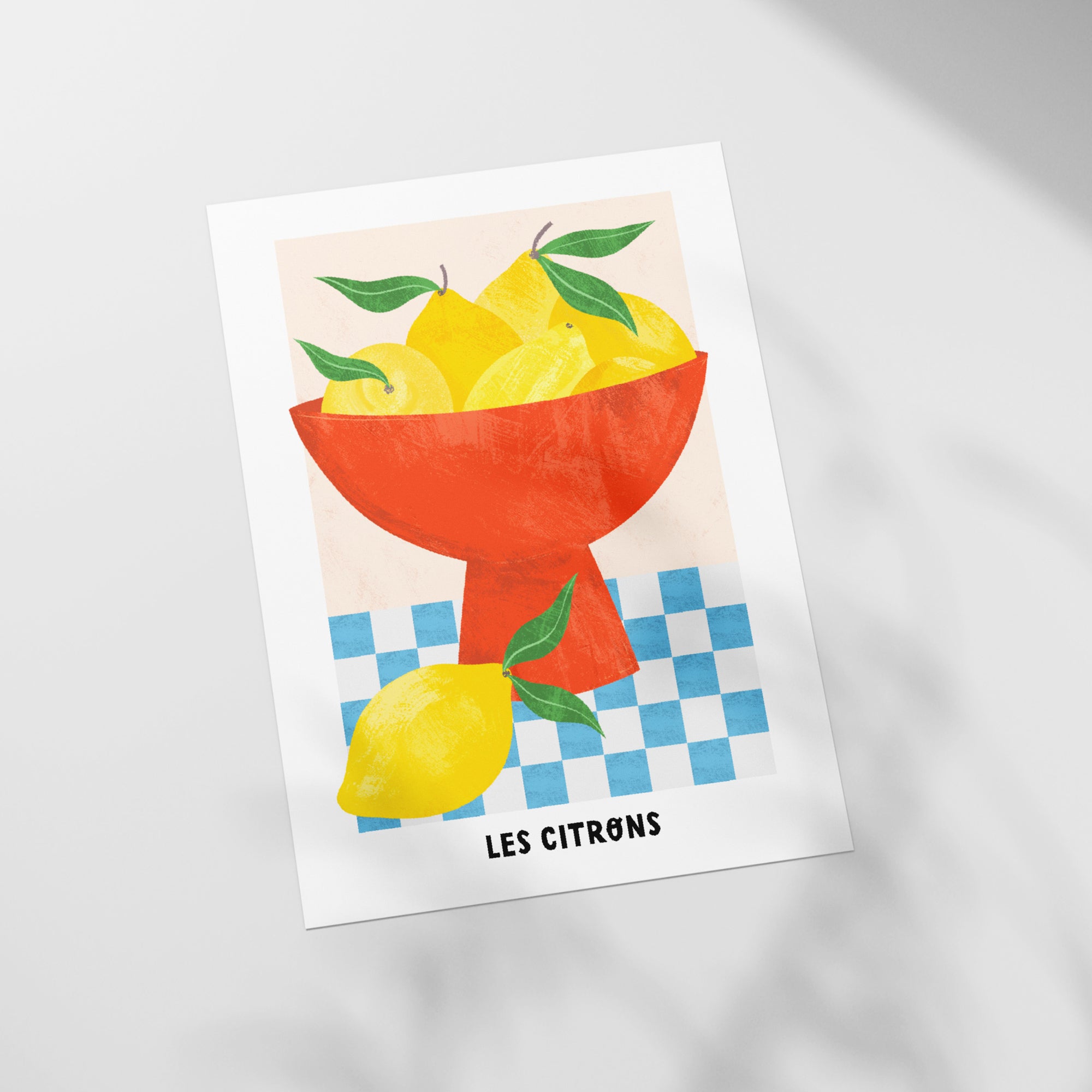 a picture of a bowl of lemons on a table