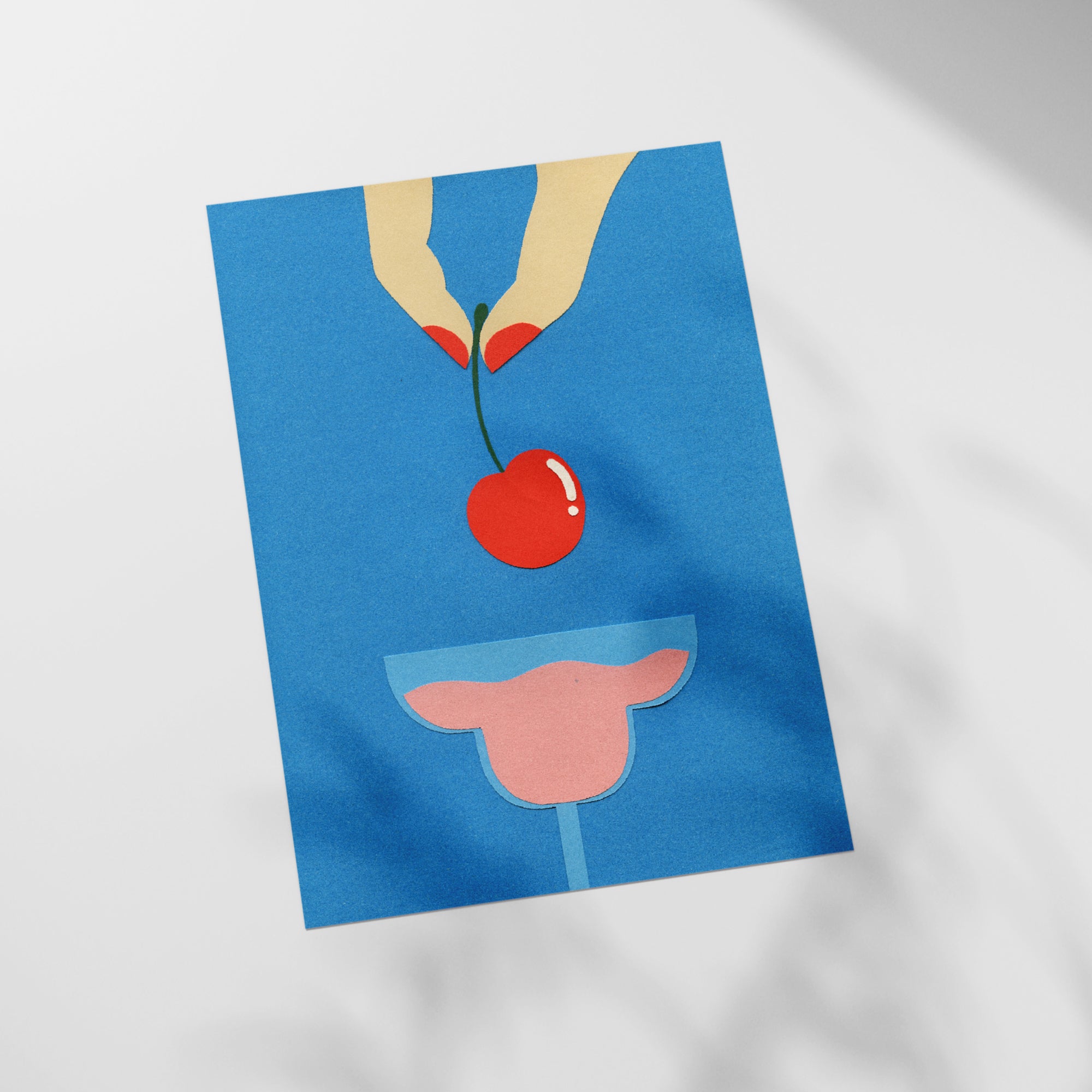 a piece of paper with a cherry on it