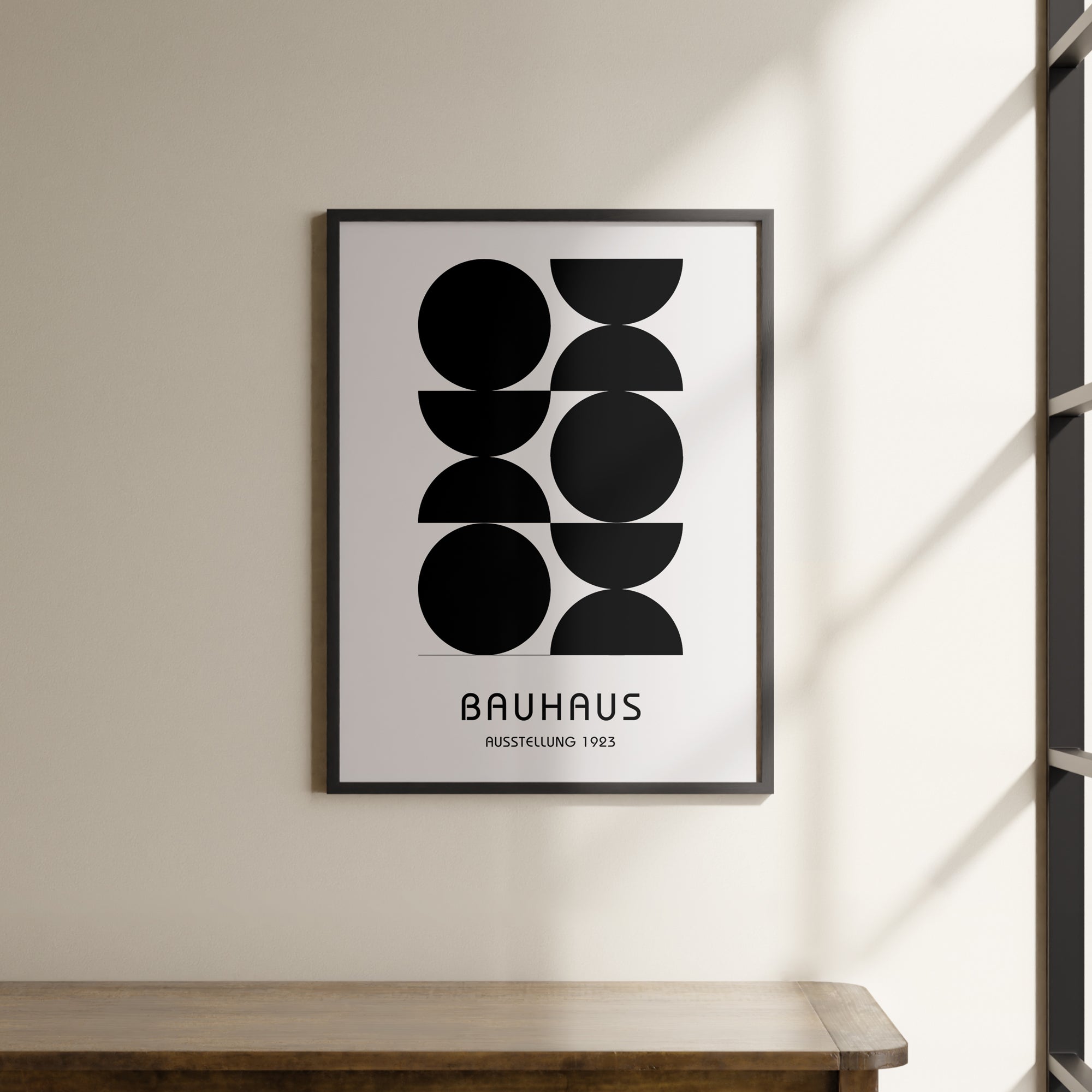 a black and white poster hanging on a wall