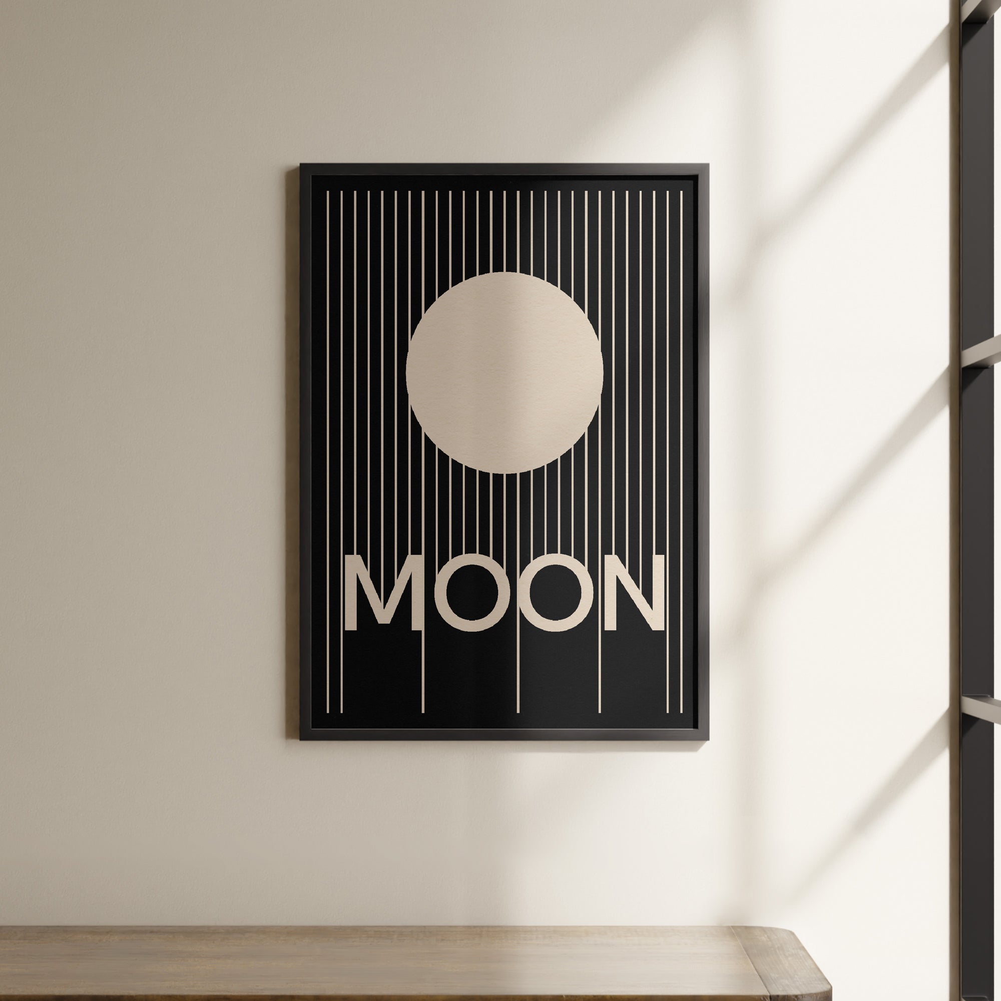 a picture of a moon hanging on a wall