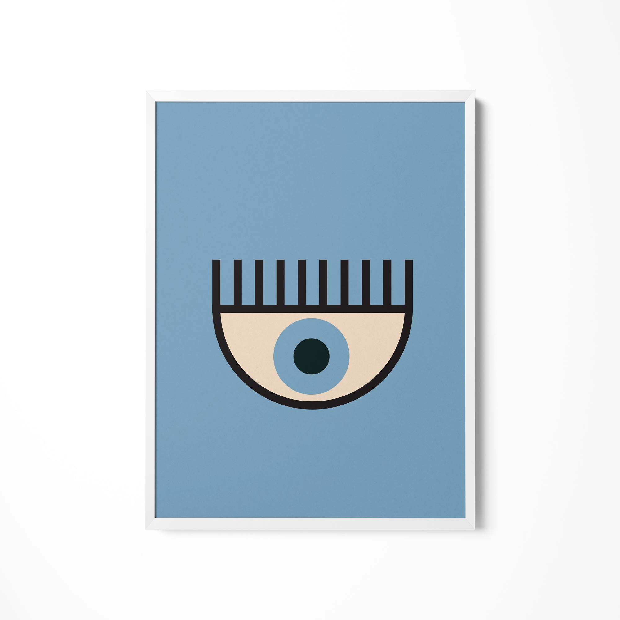 a picture of a blue eye with a black dot on it