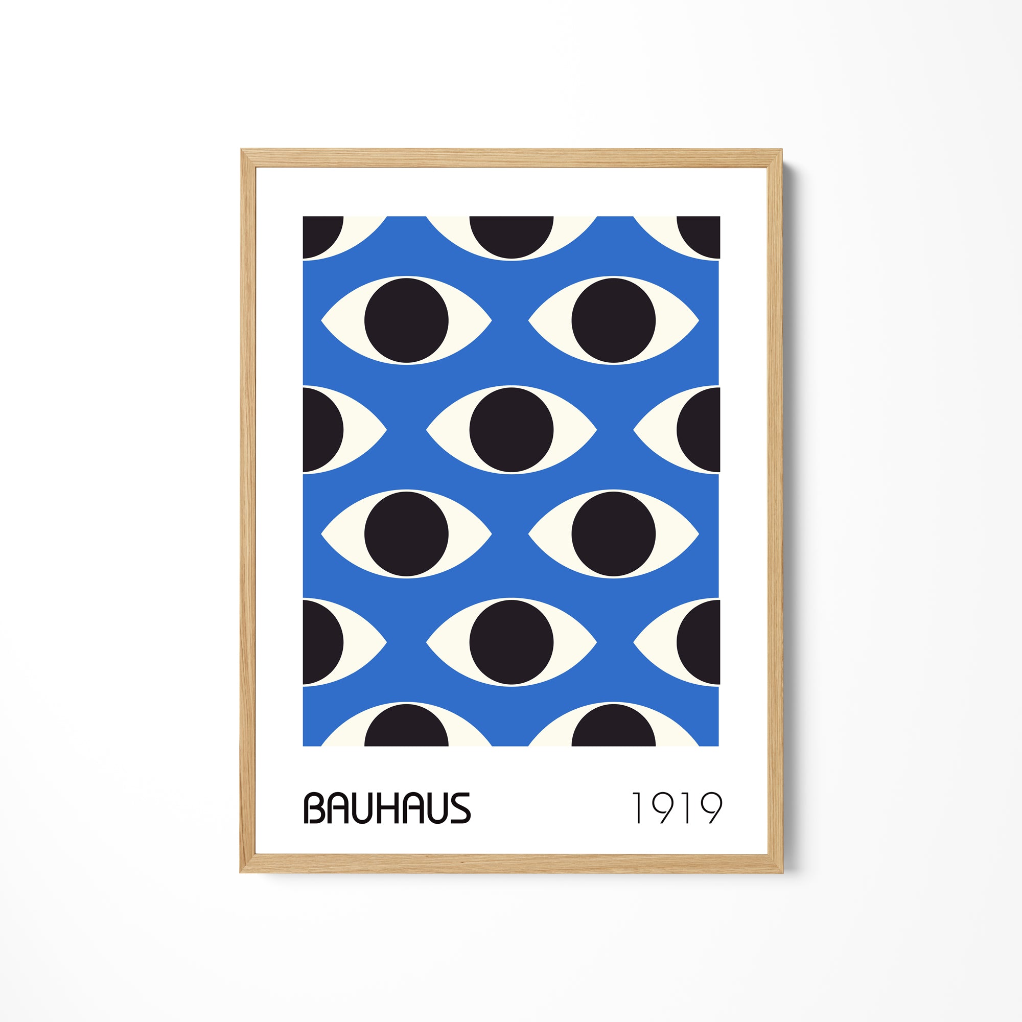 a blue poster with black and white circles on it