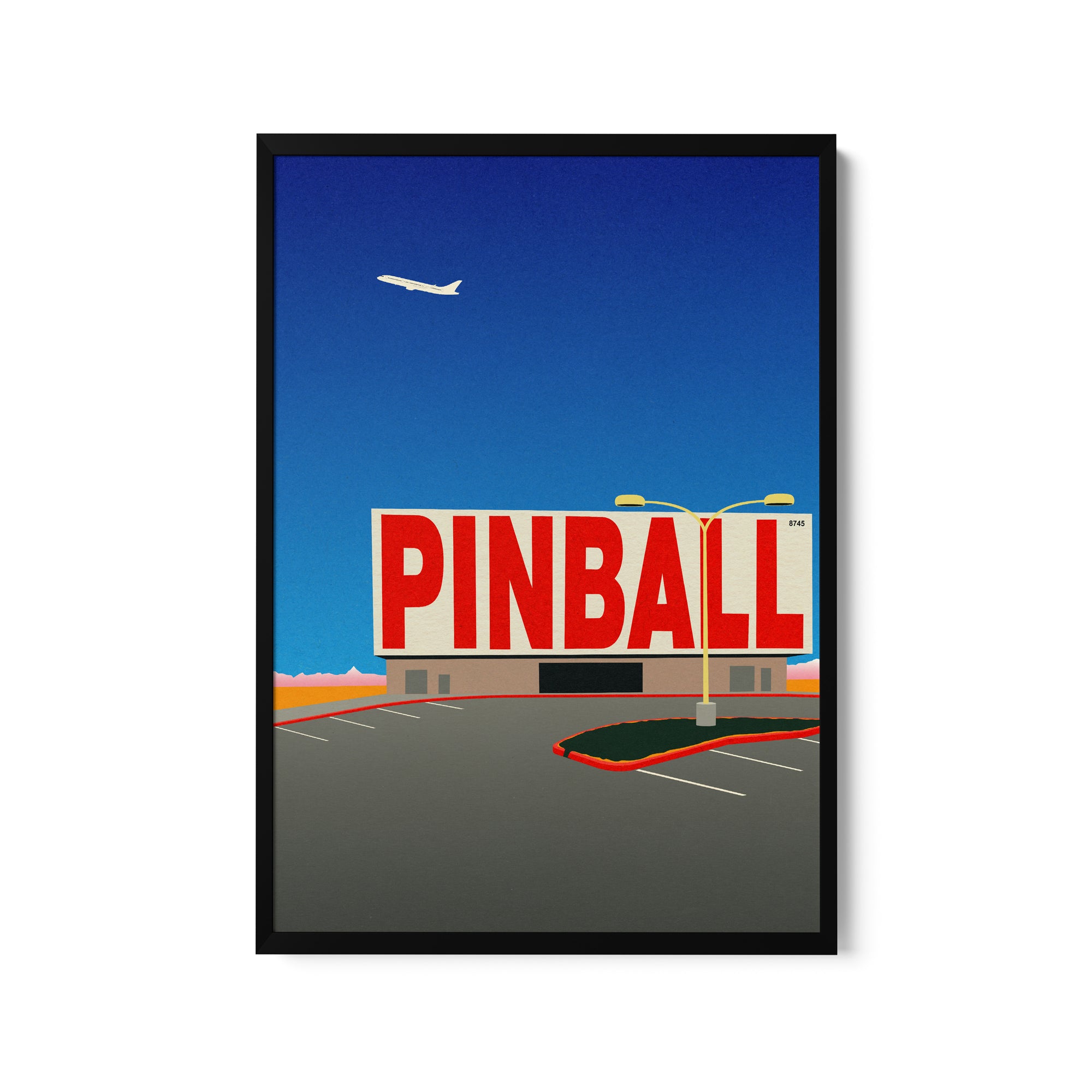 a picture of a pinball sign with a plane in the background