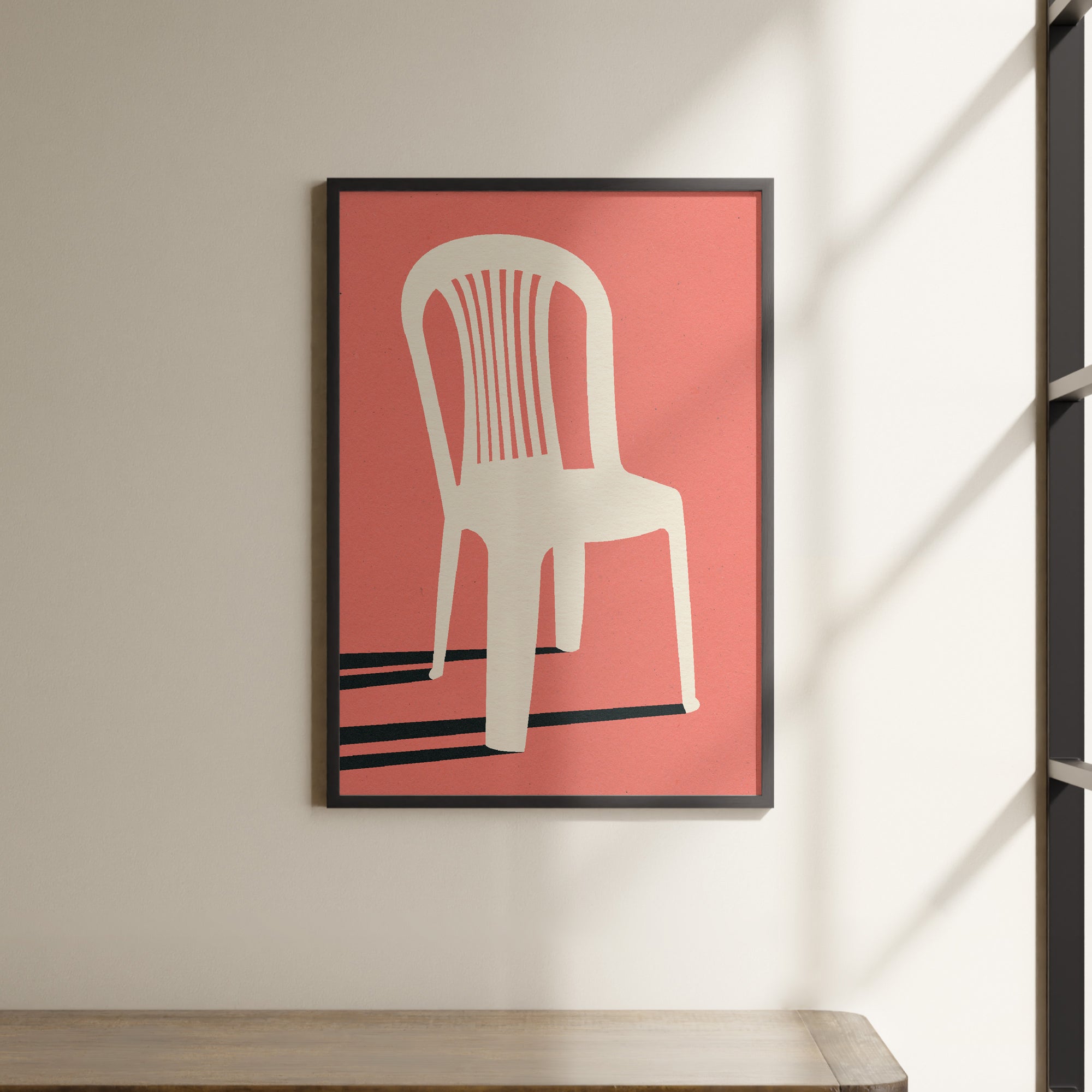 a picture of a chair hanging on a wall