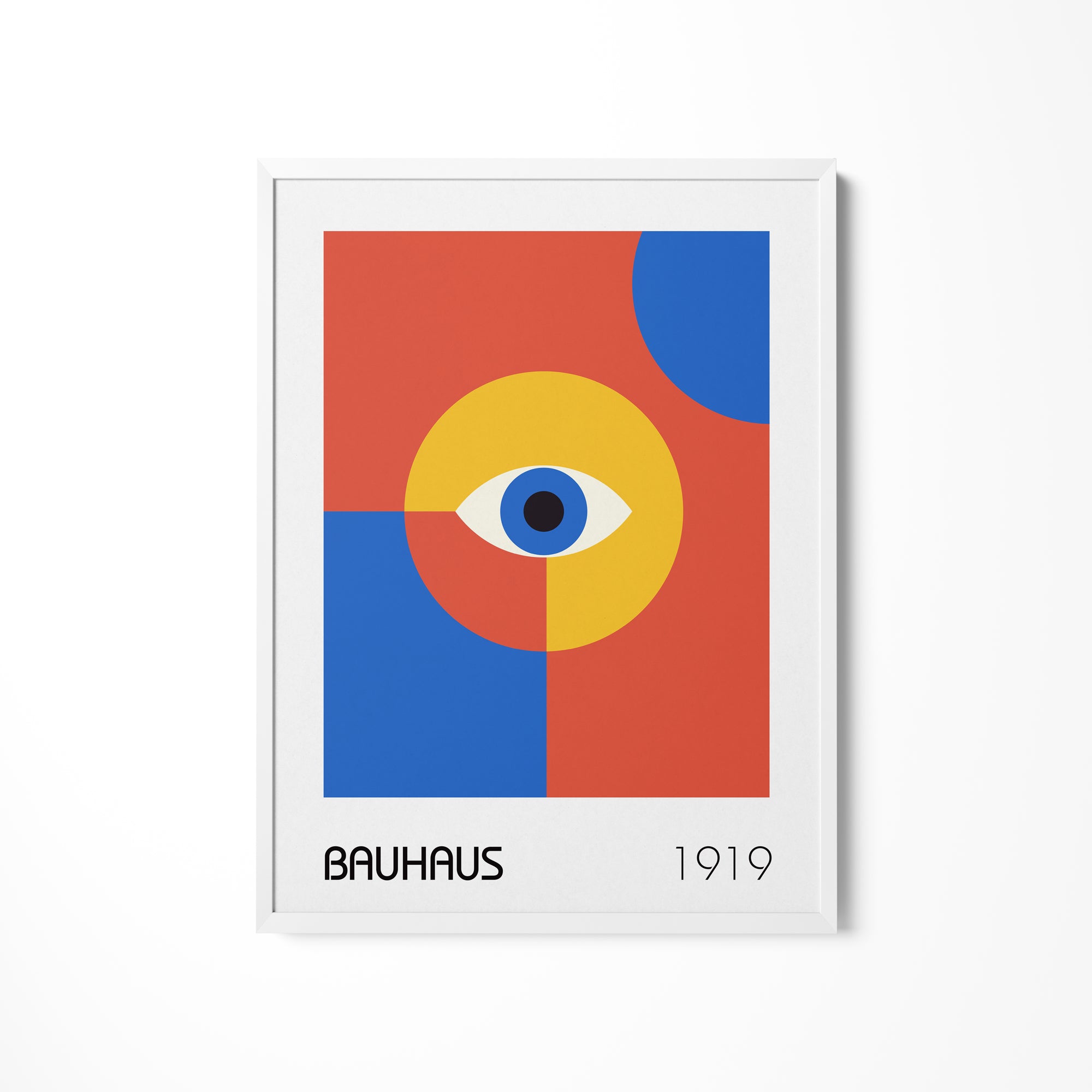 a picture of an eye on a white wall