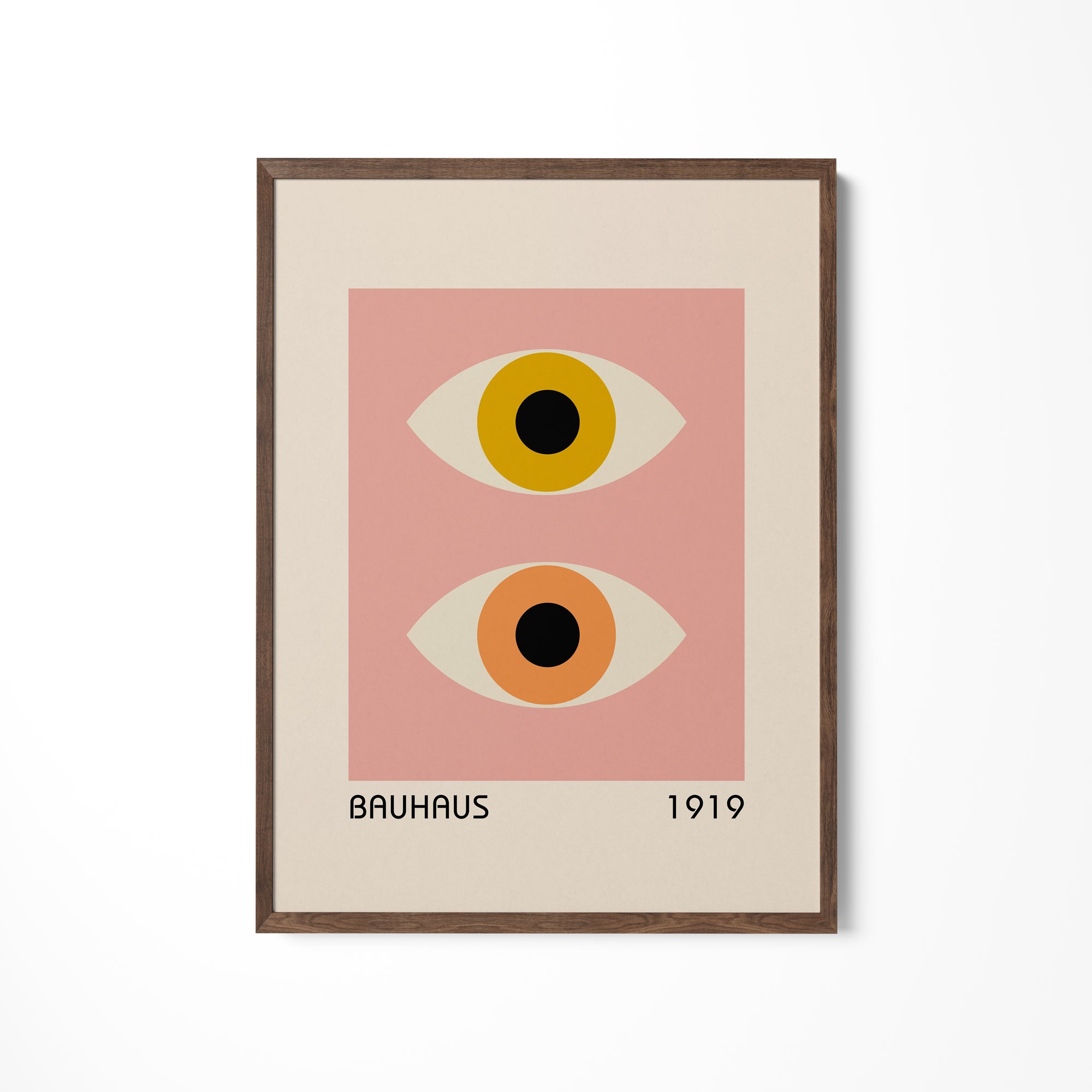 a picture of two eyes on a white wall