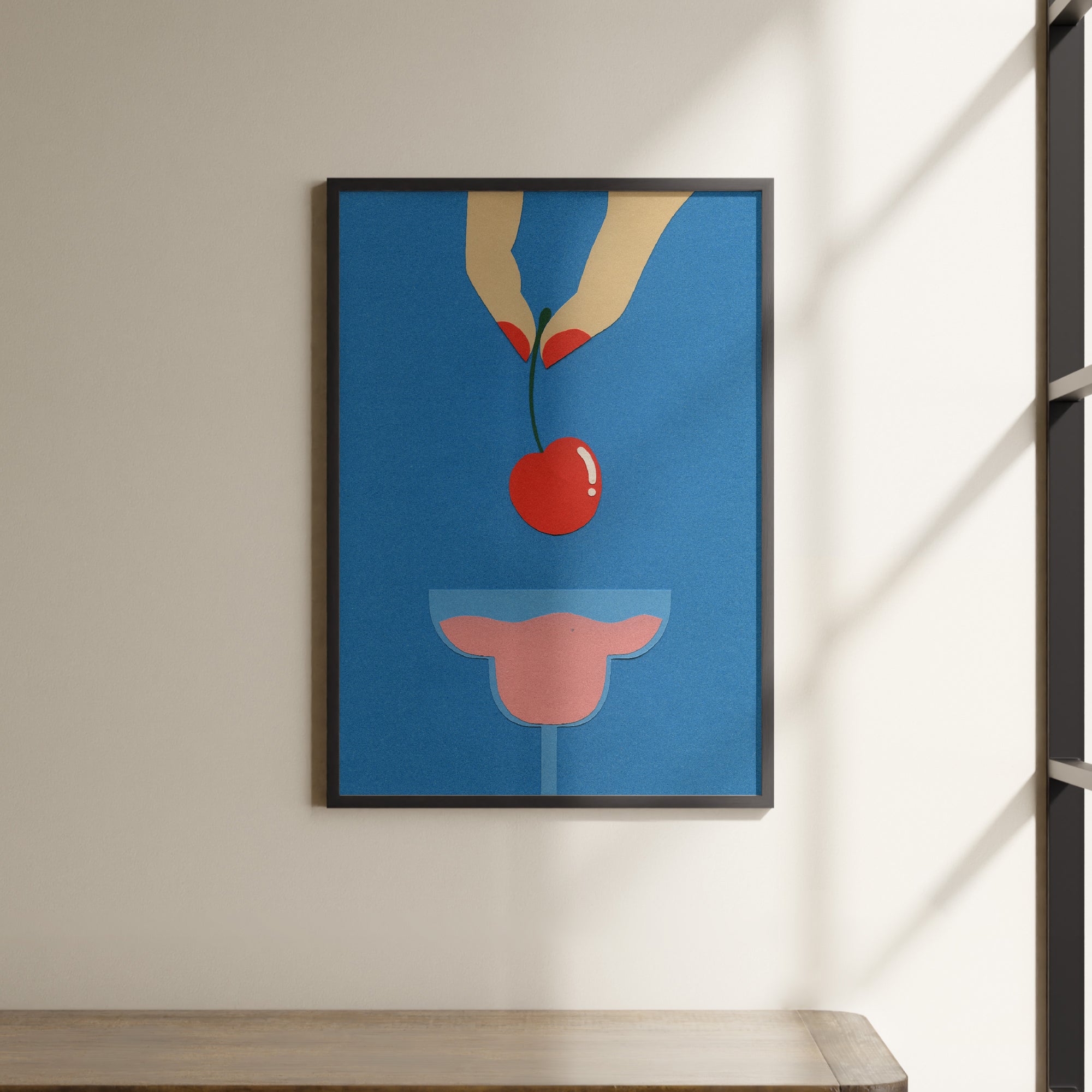 a picture of a cherry hanging on a wall