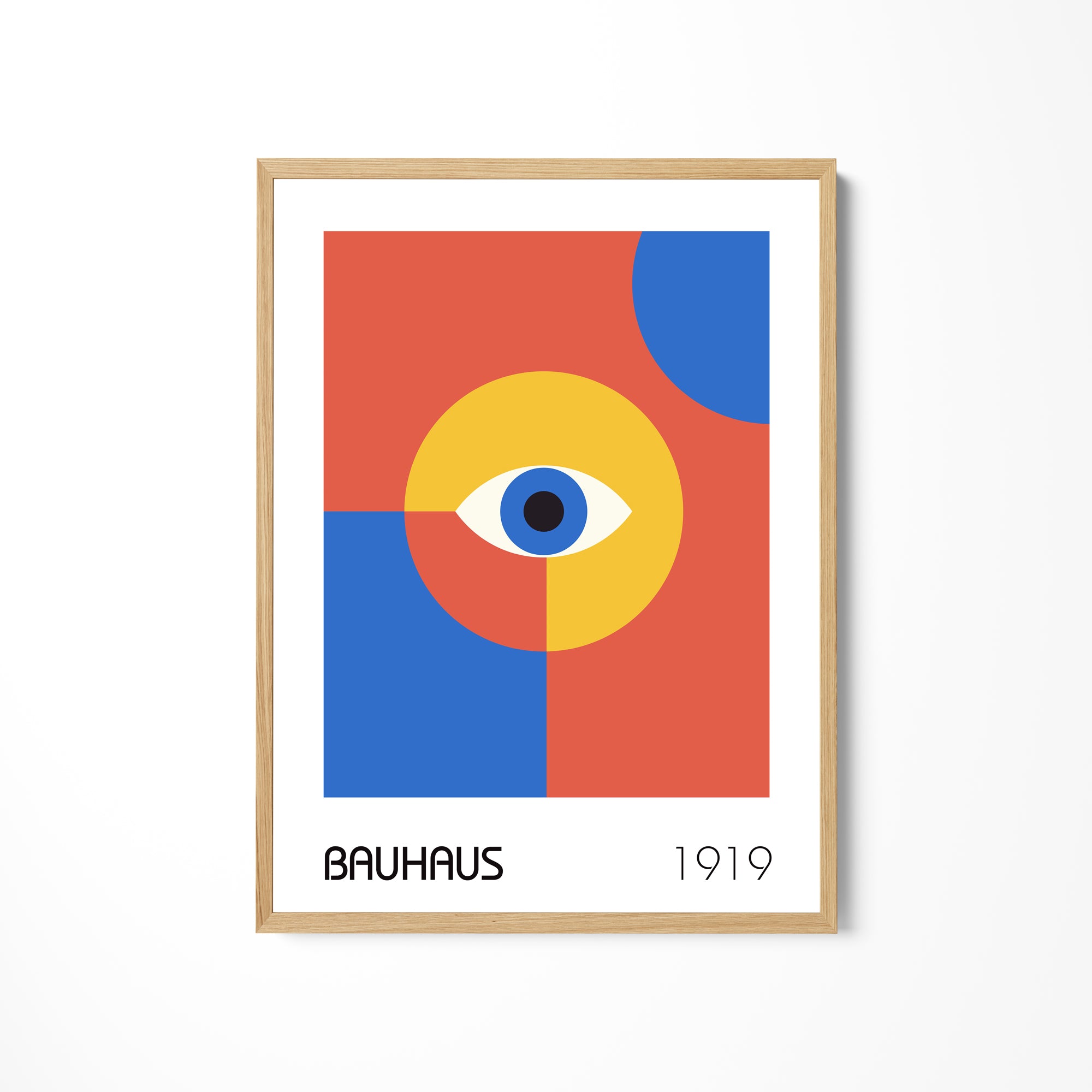 a picture of an eye on a white wall