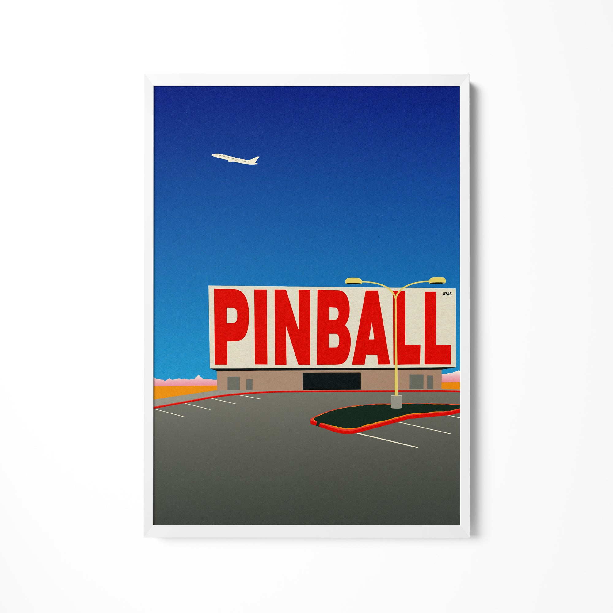 a picture of a pinball sign in a parking lot