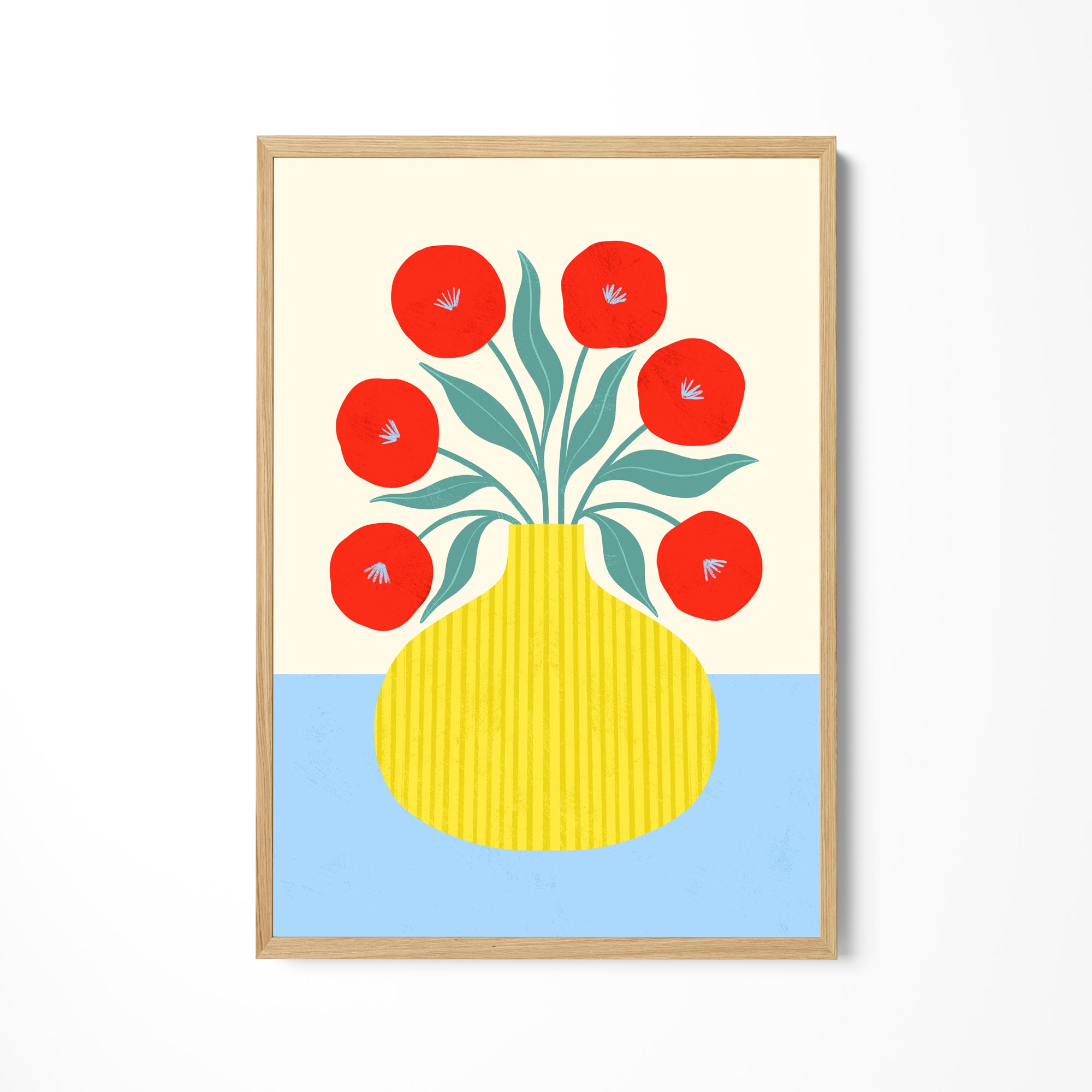 a picture of a yellow vase with red flowers