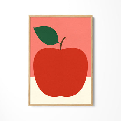 a picture of a red apple with a green leaf