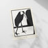 a black and white picture of a bird sitting on a window sill