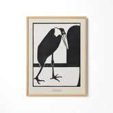 a black and white picture of a bird on a wall