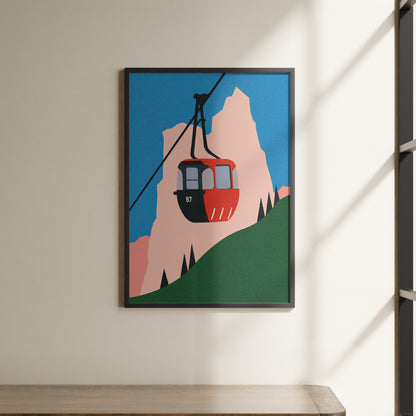 a picture of a ski lift hanging on a wall