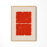 a picture of a red flower on a white wall