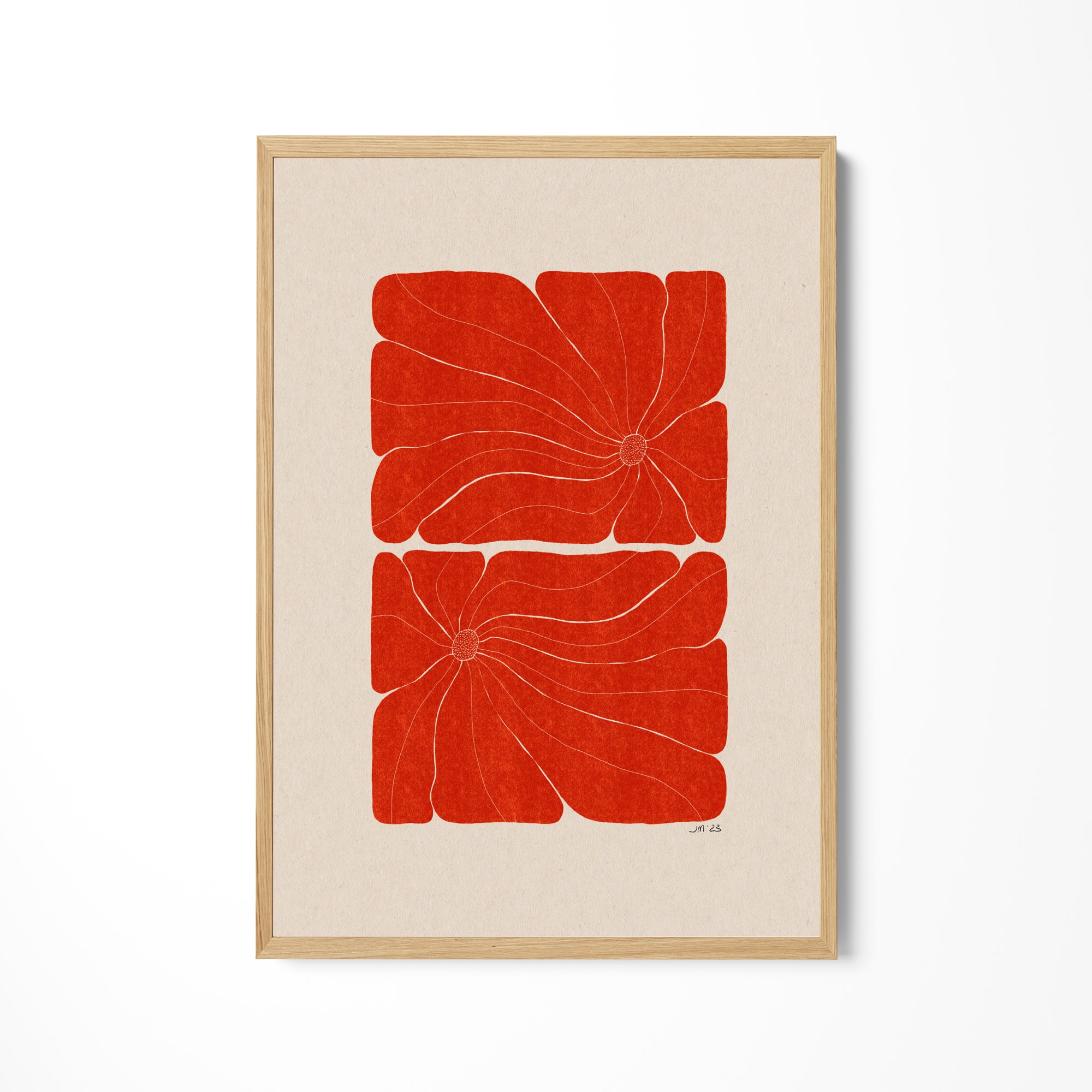 a picture of a red flower on a white wall