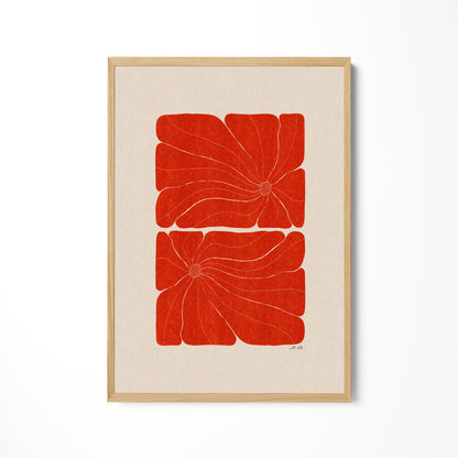 a picture of a red flower on a white wall