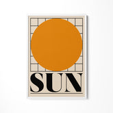 a picture of a sun on a white wall