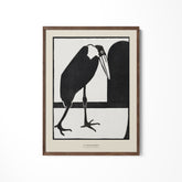 a black and white picture of a bird on a wall