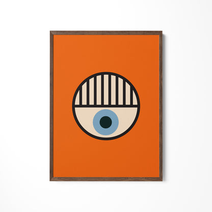 an orange square with a blue eye on it