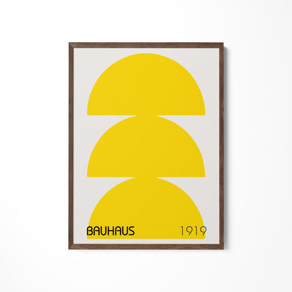a yellow and white poster hanging on a wall