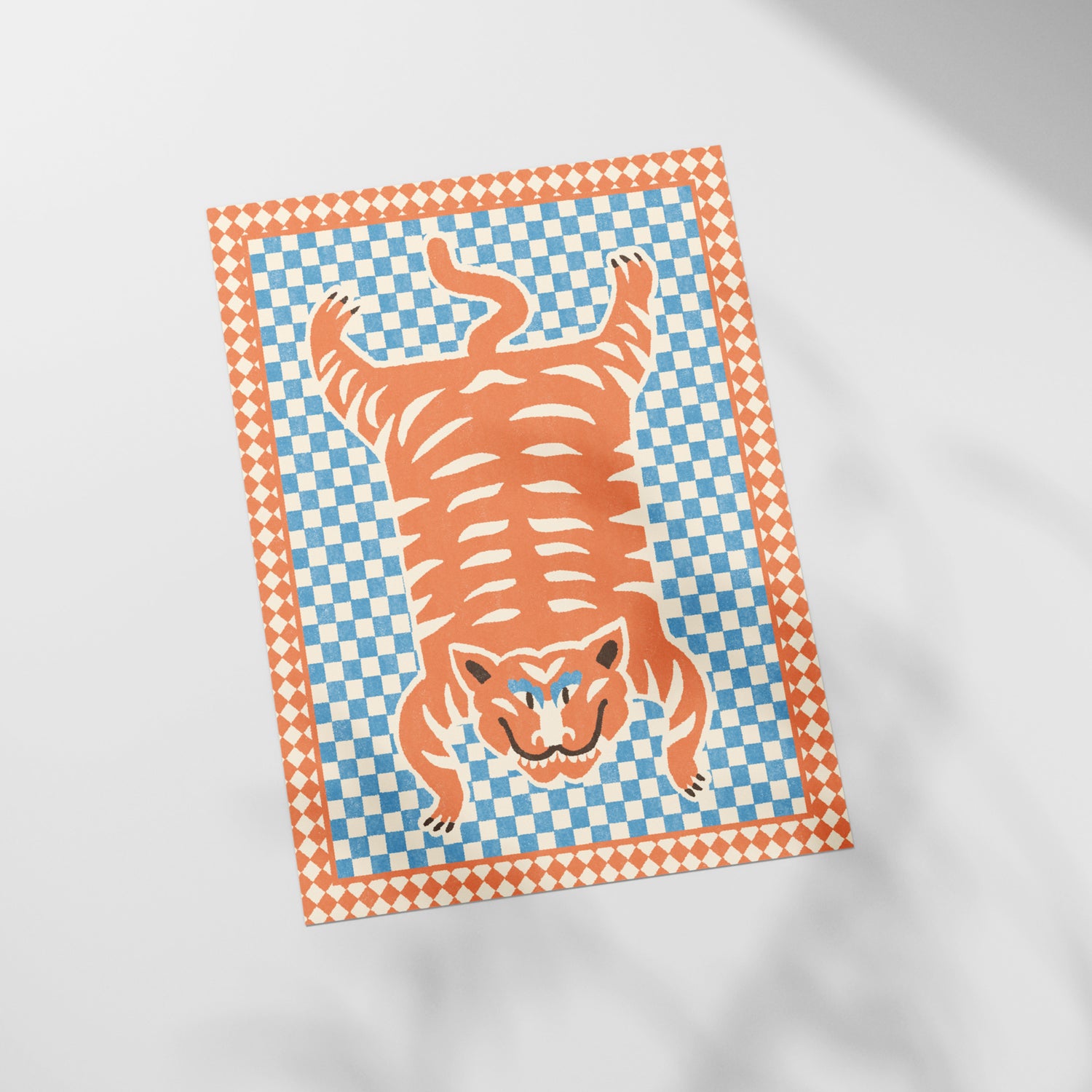 a picture of a tiger on a checkered paper