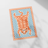 a picture of a tiger on a checkered paper